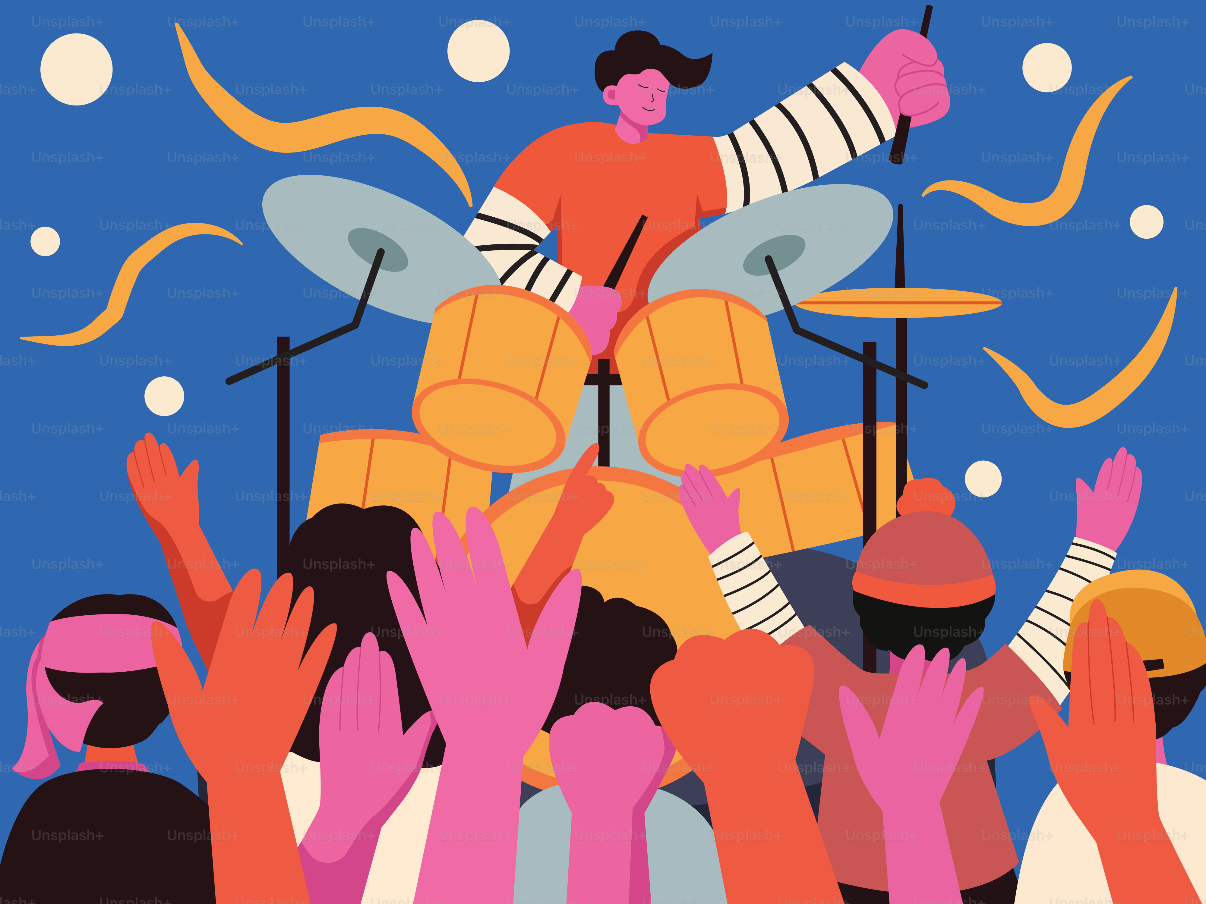 A drummer plays, celebrating with an excited crowd.