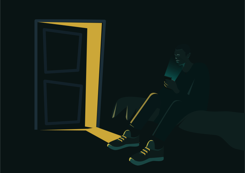 A person uses phone near an open door.