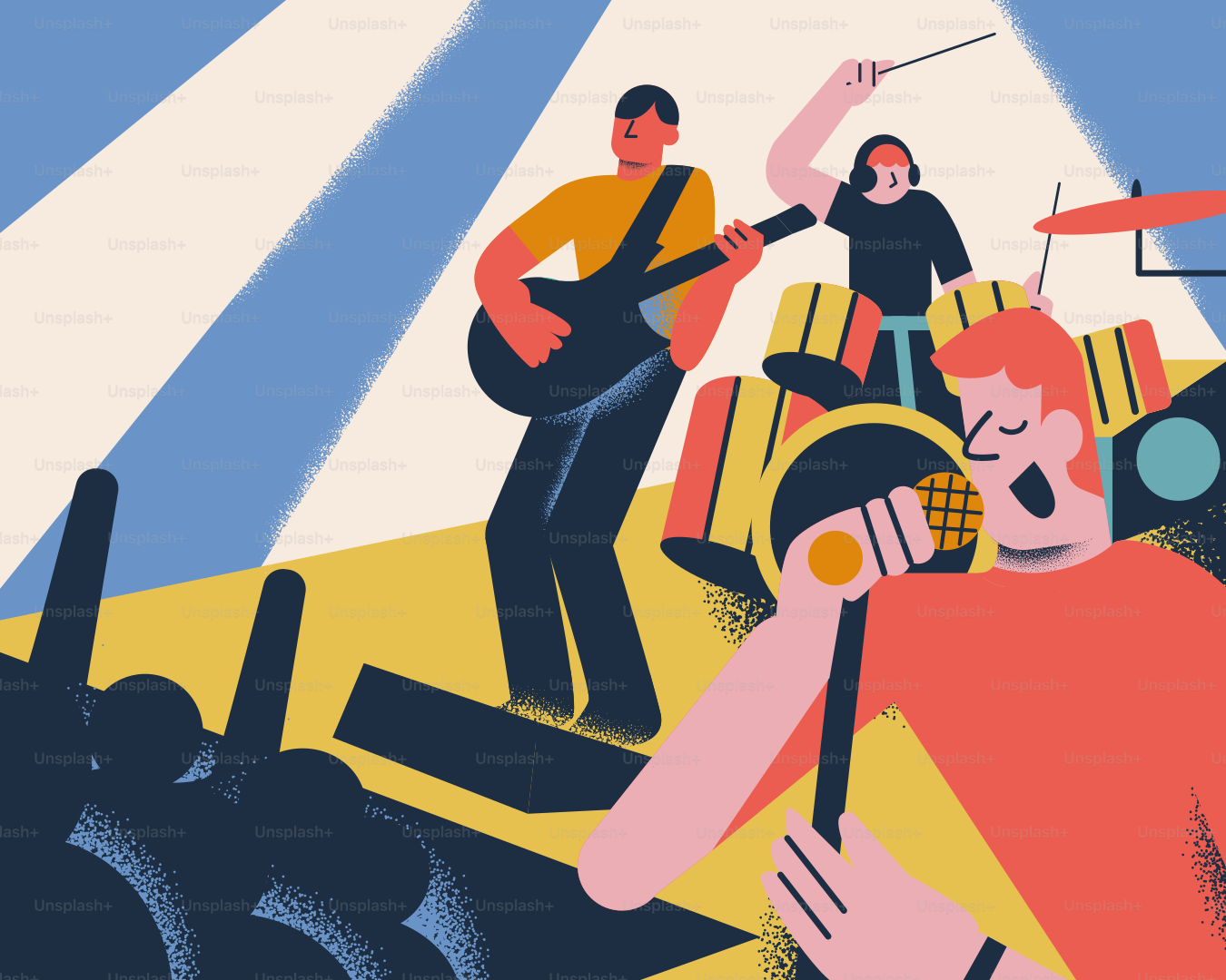 A band performs on stage with lights.