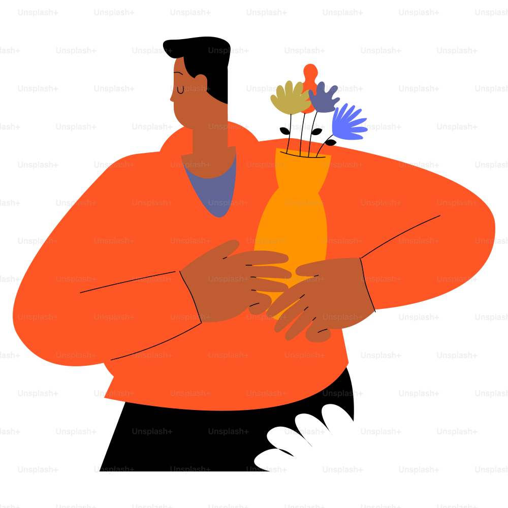 A person holds a vase of flowers.