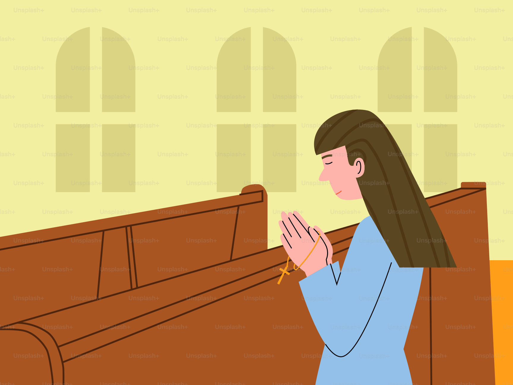 A woman prays in a church.