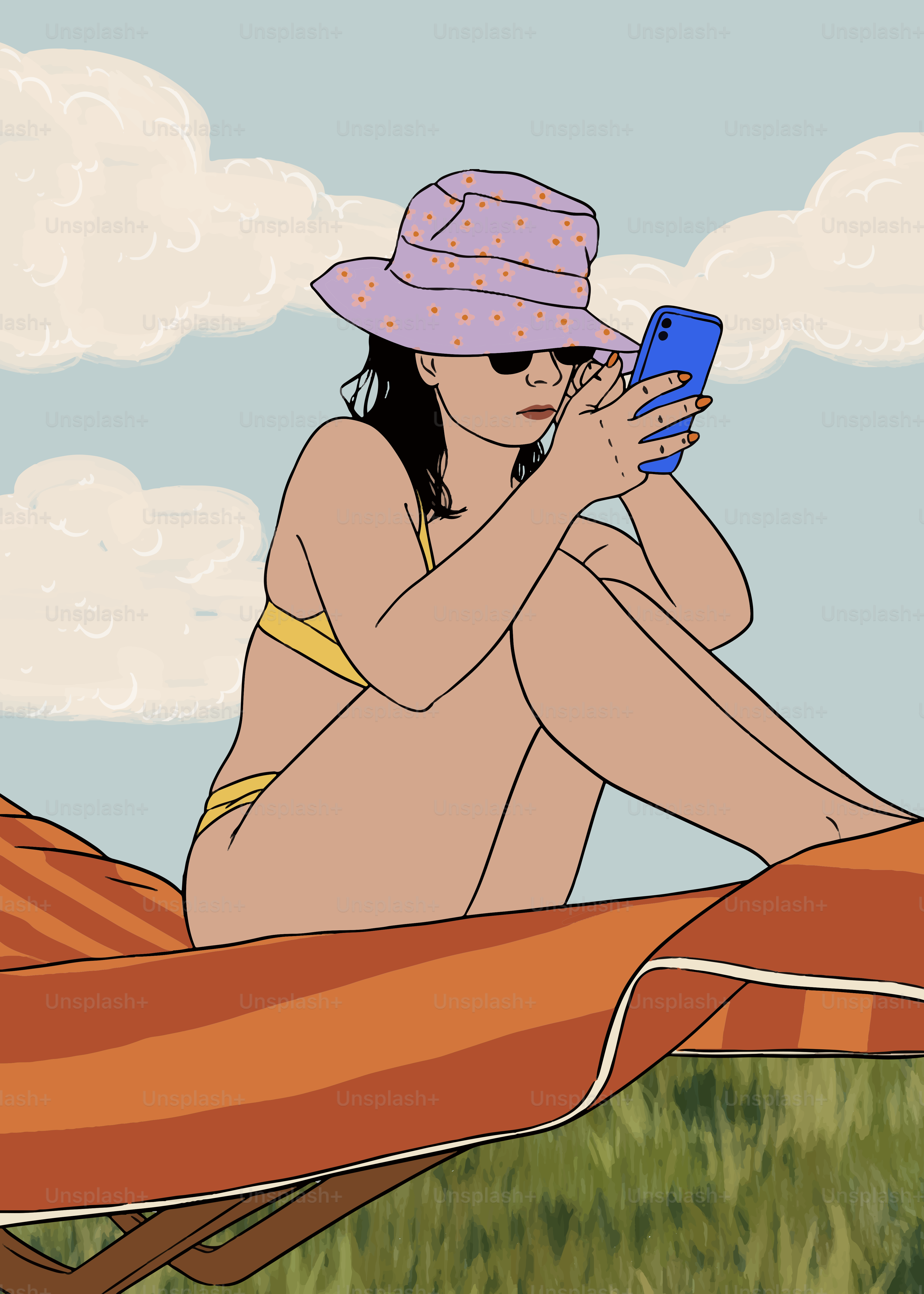 女性がビーチでくつろぎ、スマホに夢中になっている。