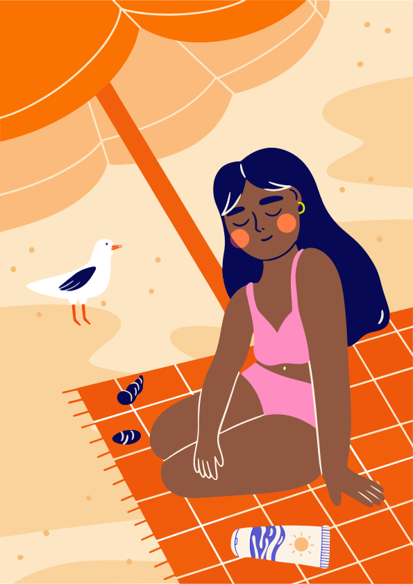 カモメと一緒にビーチでくつろぐ女性。