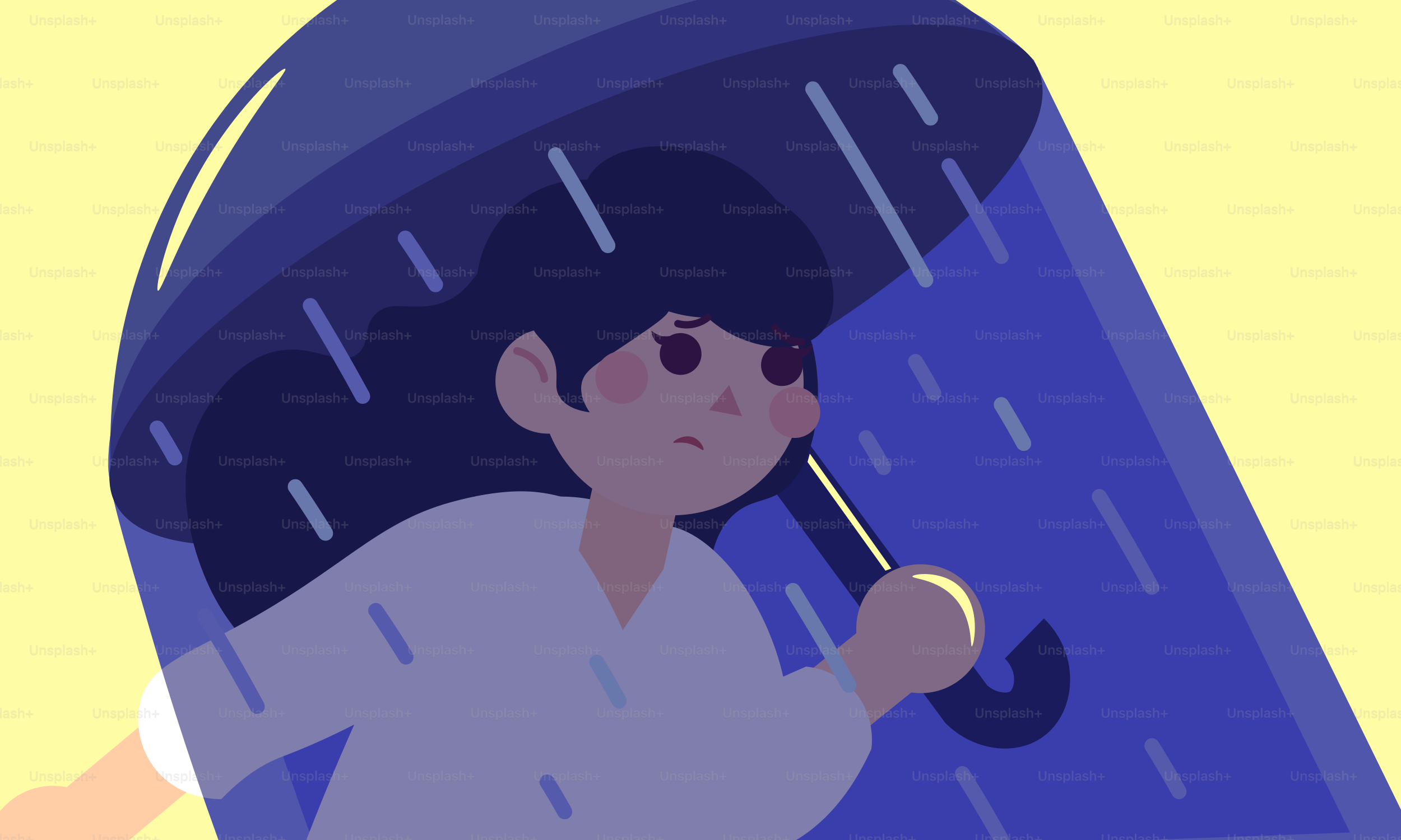 女性は傘の下で雨を避けている。