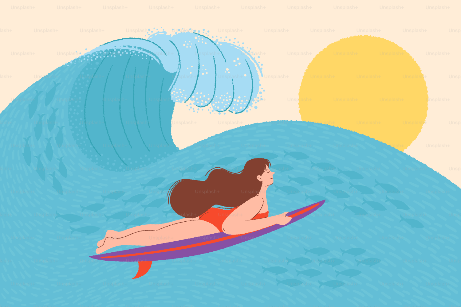 A woman surfs a wave in the ocean.
