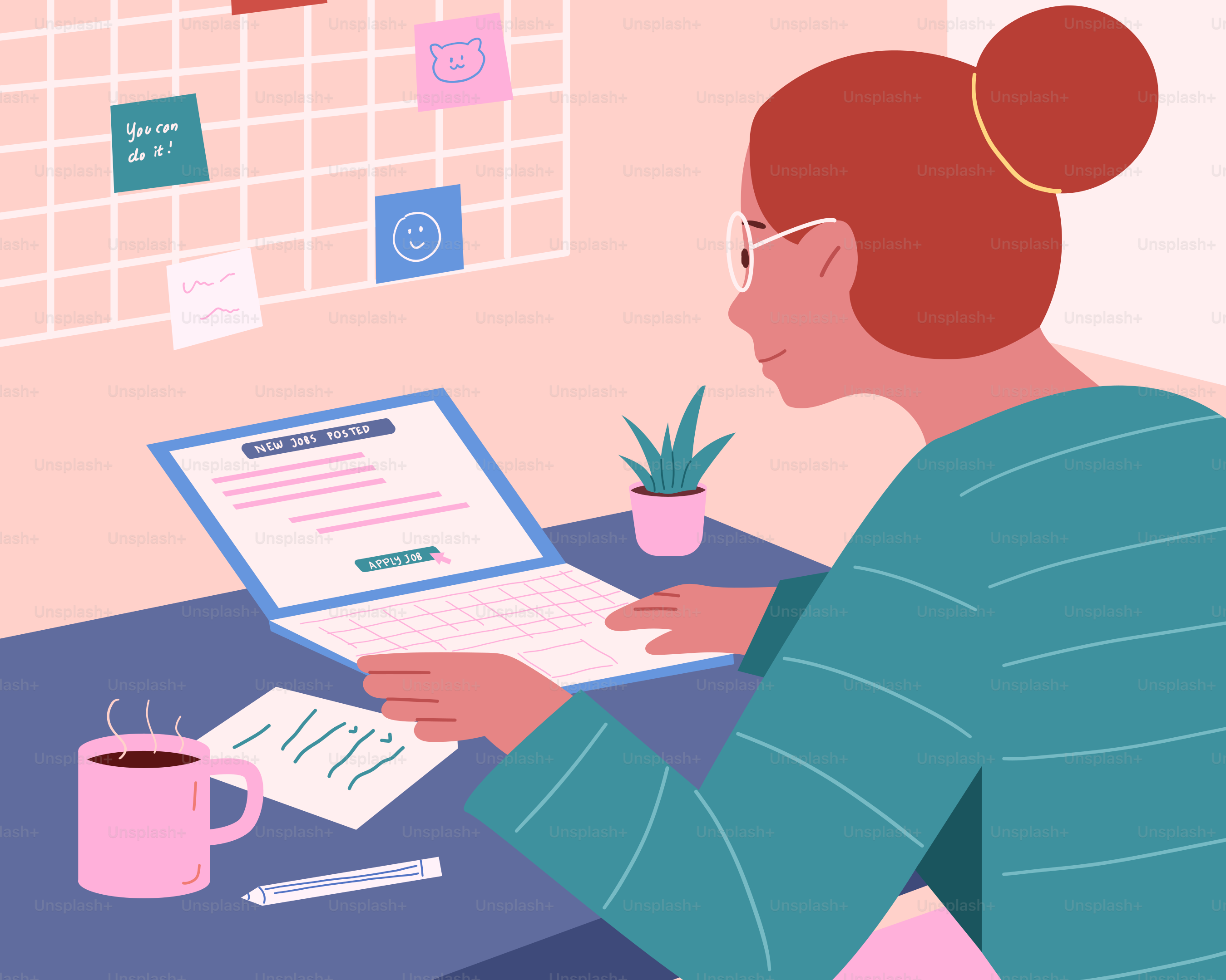 A woman works on a laptop at her desk.