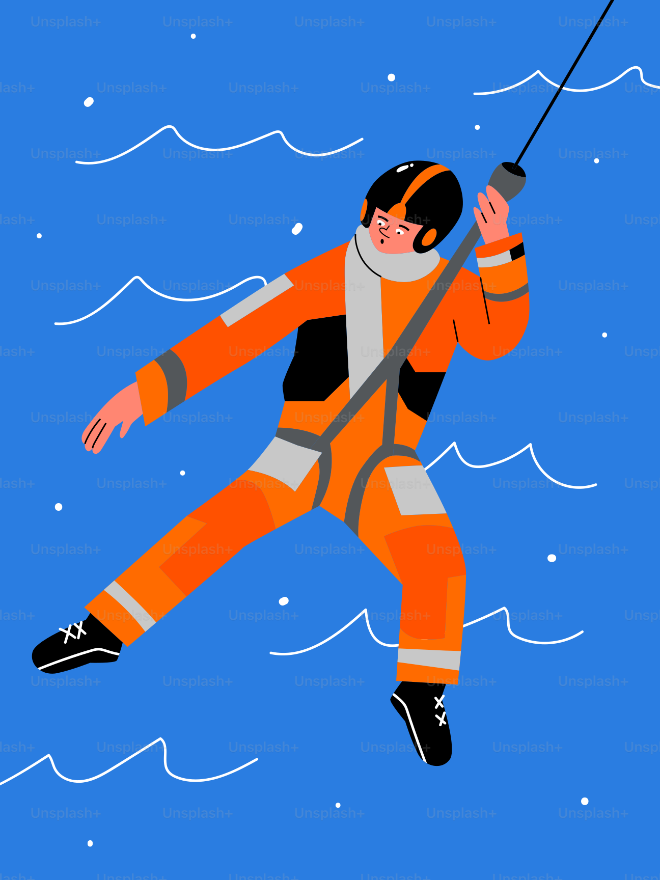 A rescue worker being lowered into the water.