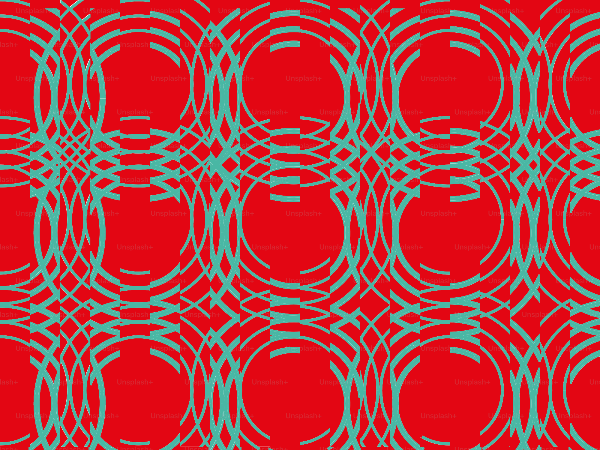 赤と緑の円が鮮やかで繰り返されるパターンを作り出しています。