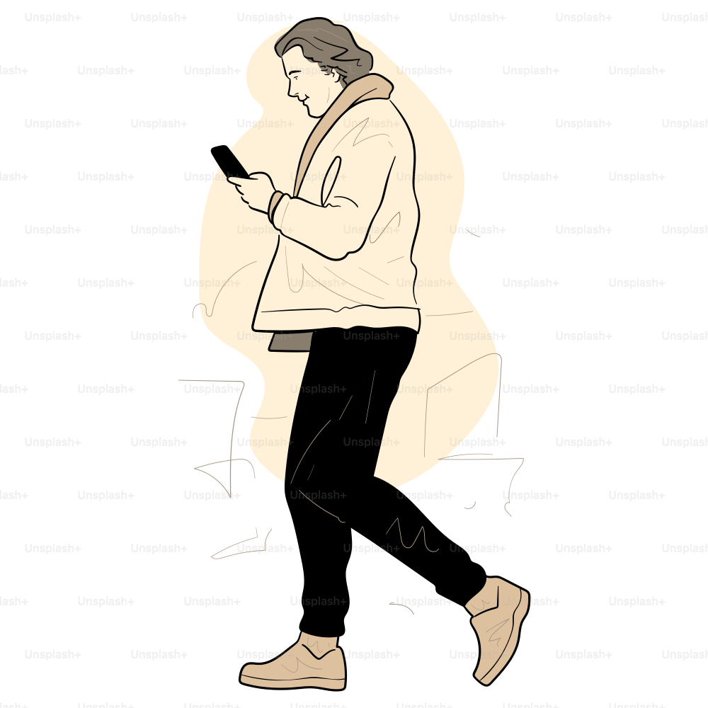 A person walks while looking at their phone.