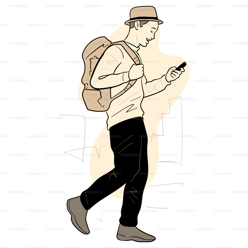 A man is walking while looking at his phone.