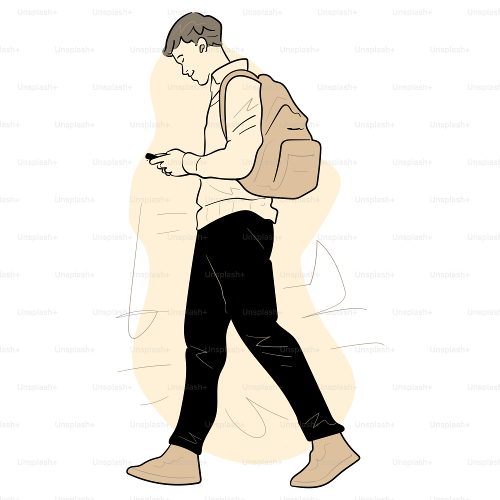 A man is walking while looking at his phone.