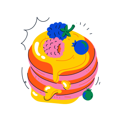 Delicious pancakes drizzled with syrup and berries.