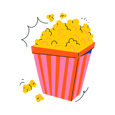 Popcorn is spilling from its classic container.