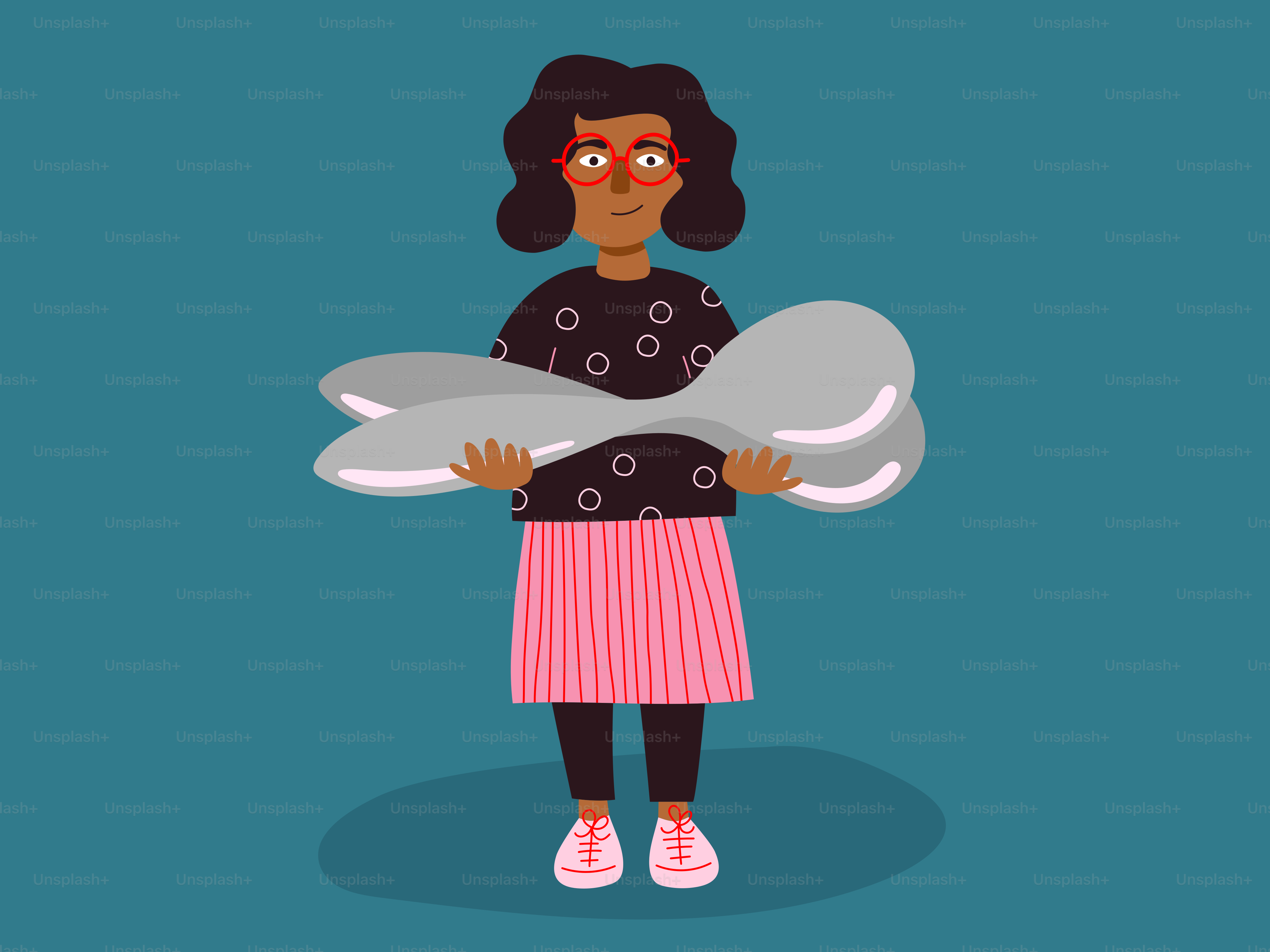 A woman holds an enormous spoon.