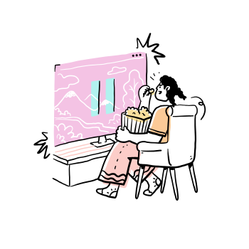 A person enjoys a movie with popcorn.