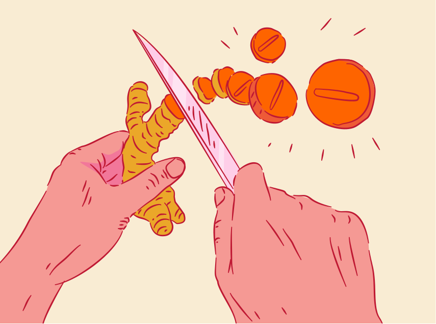 Cutting ginger root with pills nearby.