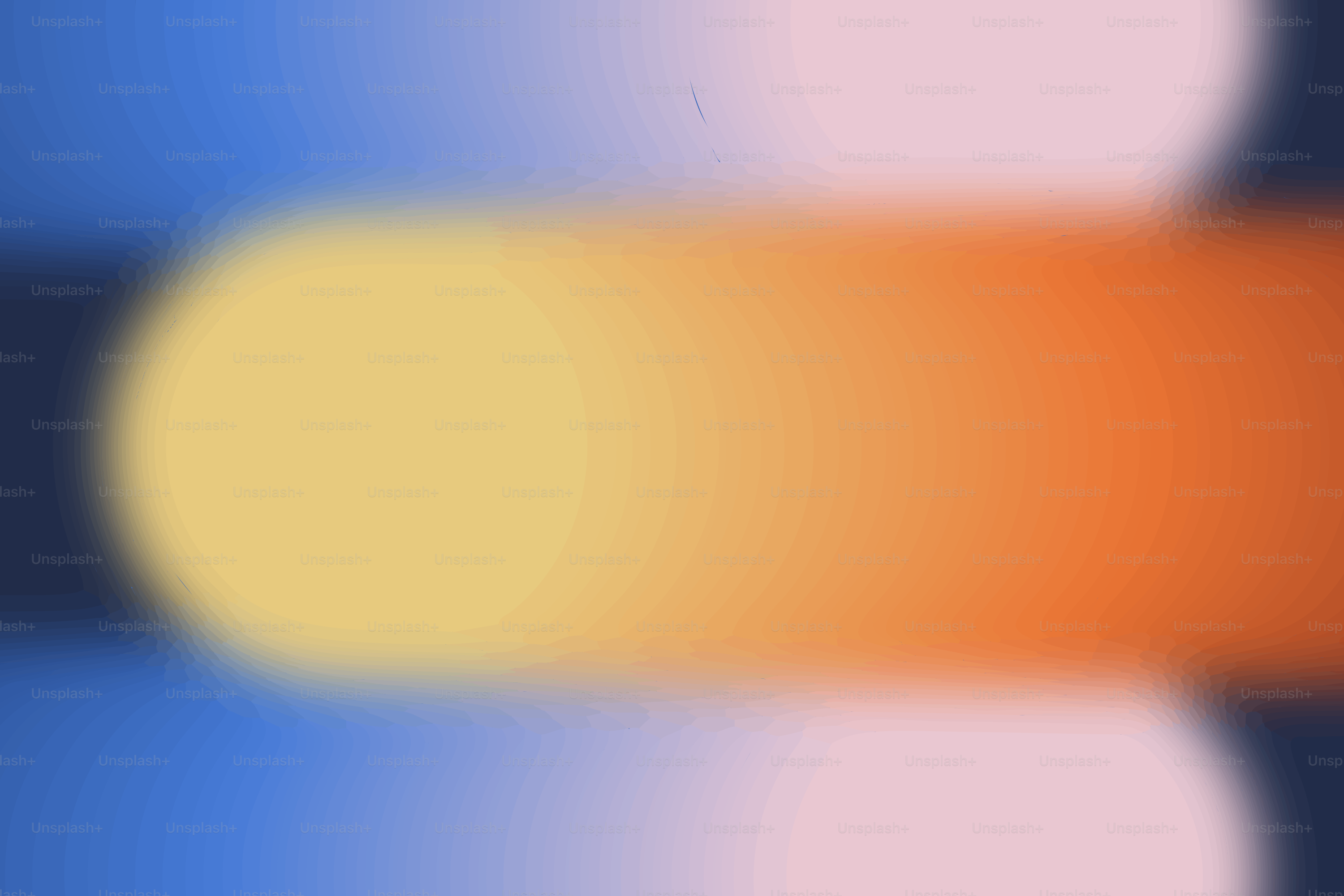 Fundo abstrato com cores suaves e borradas.