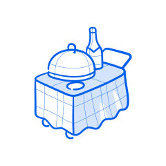 Food and wine are set on a table.