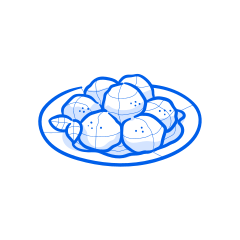 Meatballs are served on a plate.