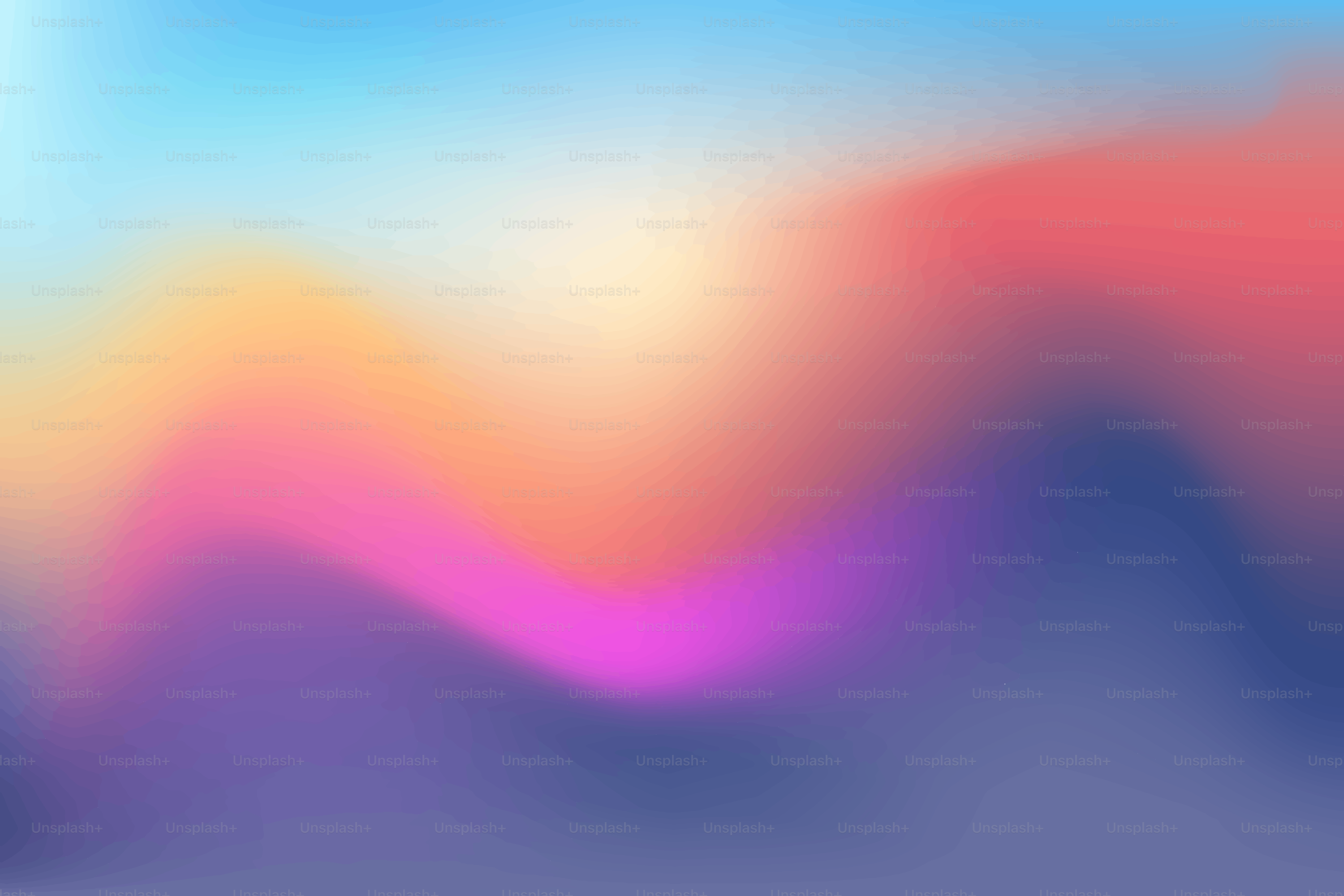A colorful, abstract gradient of various hues.