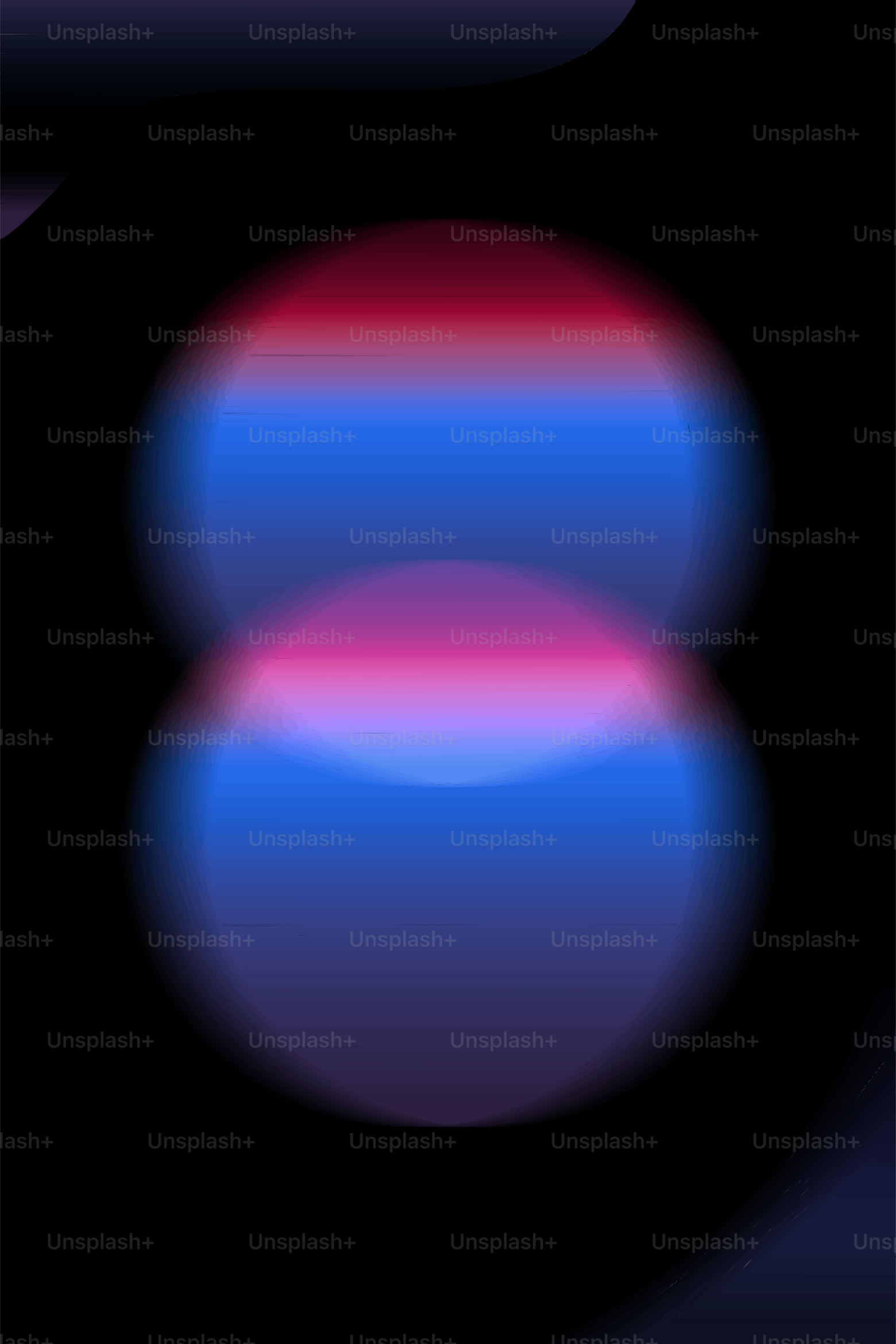 Two blurred blue orbs with red and purple accents.