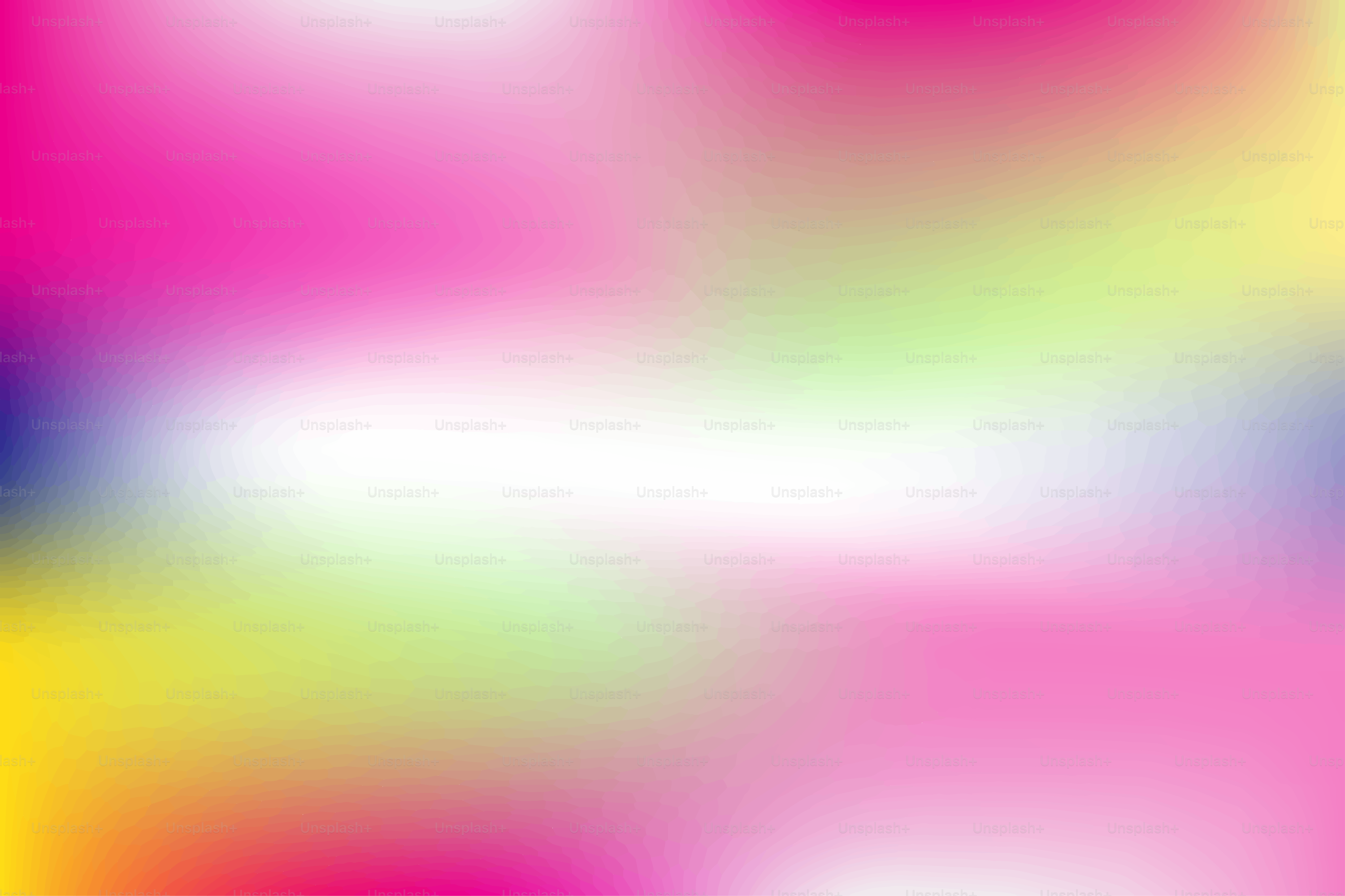 Fondo colorido y difuminado con tonos rosas, amarillos y azules.