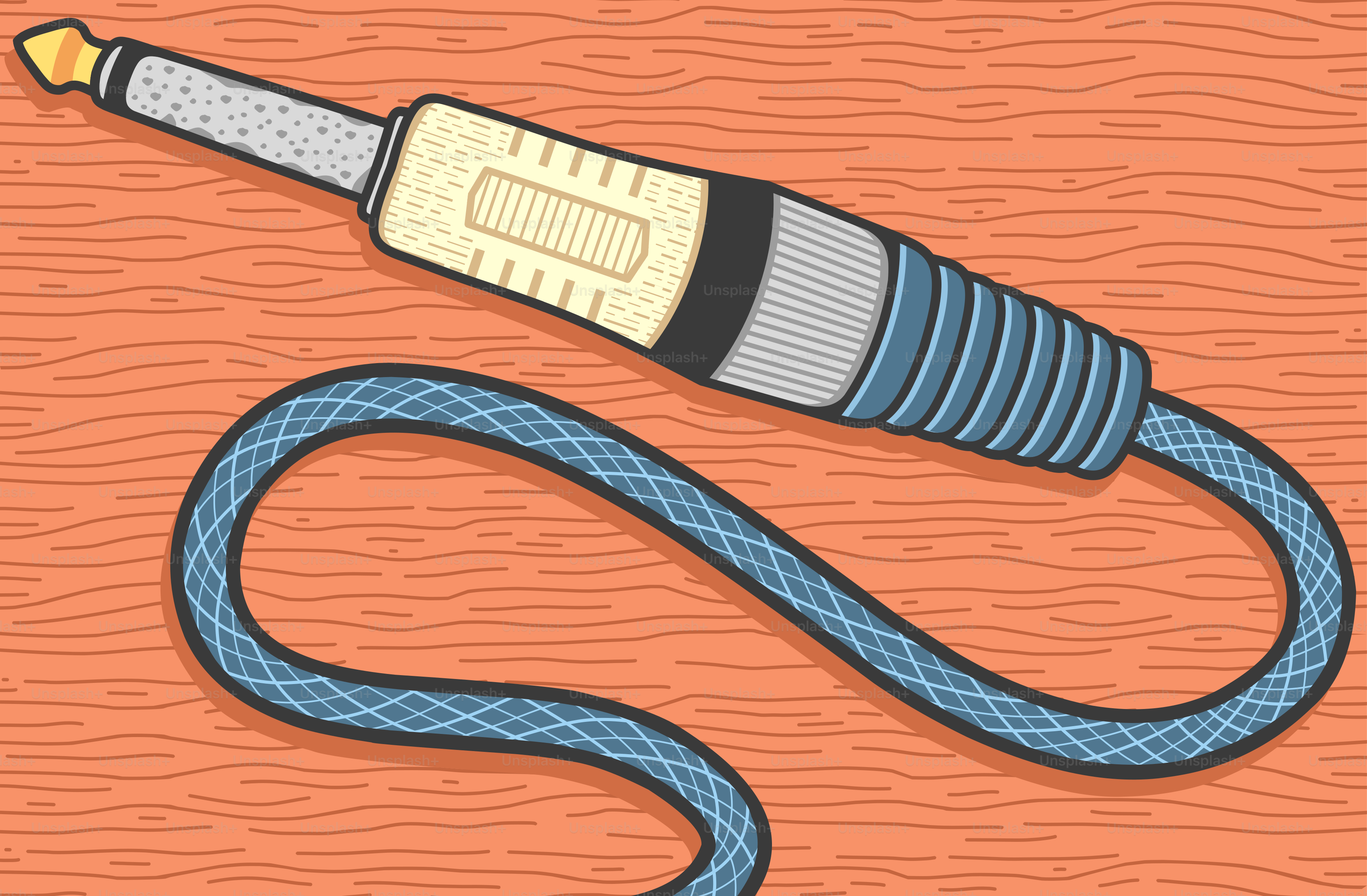 Here's a possible caption: an audio jack cable on an orange surface.