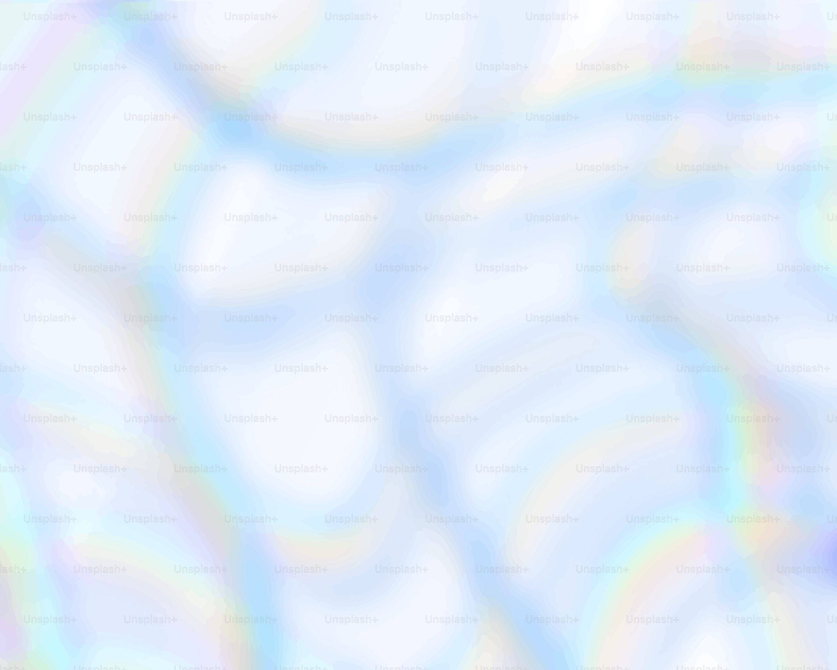 Abstract, blurry light blue and white background.
