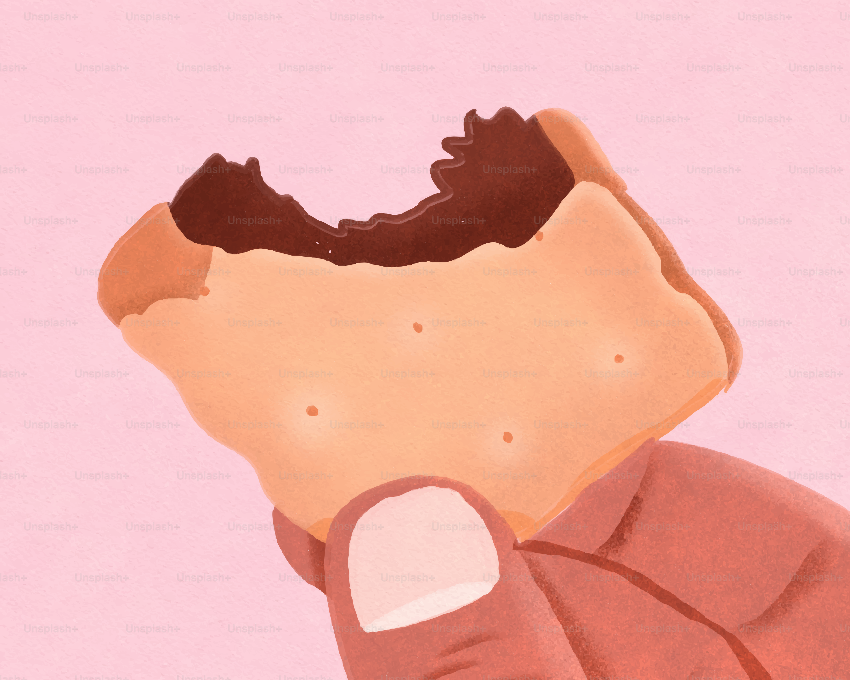 Qualcuno sta tenendo in mano un panino al cioccolato mezzo mangiato.