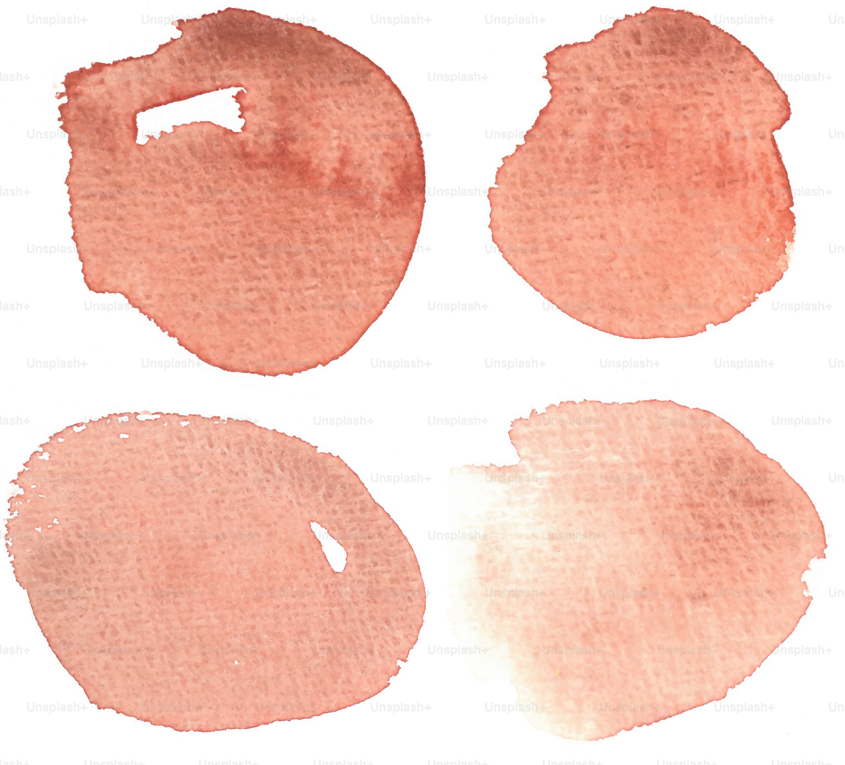 Four watercolor blots in shades of brown.