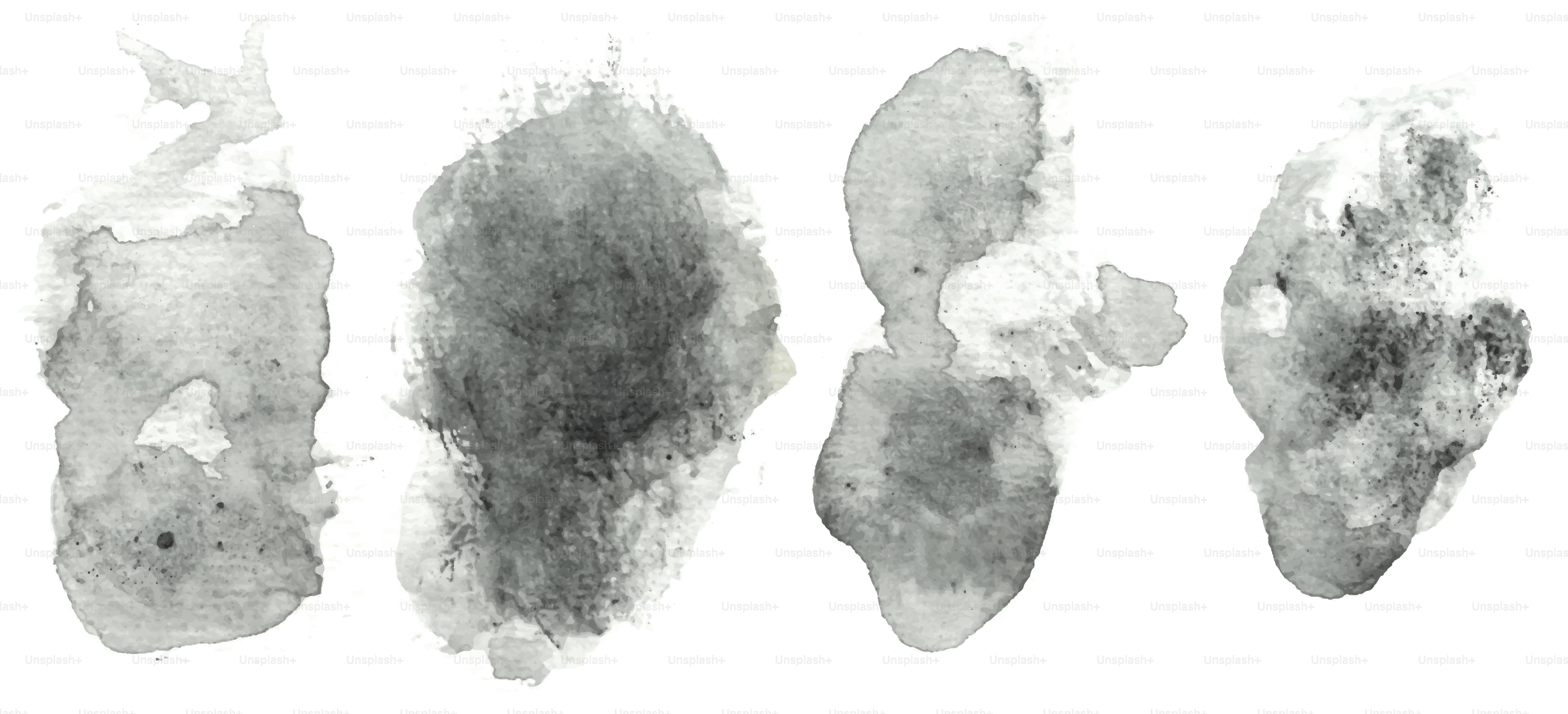 Here's a short caption: four abstract ink blot shapes on white.