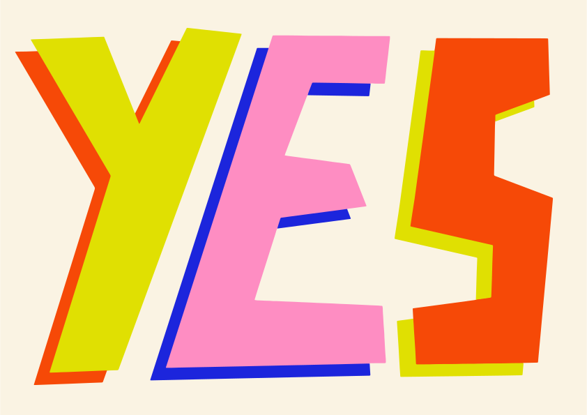 Un « oui » coloré affiché sur un fond blanc.