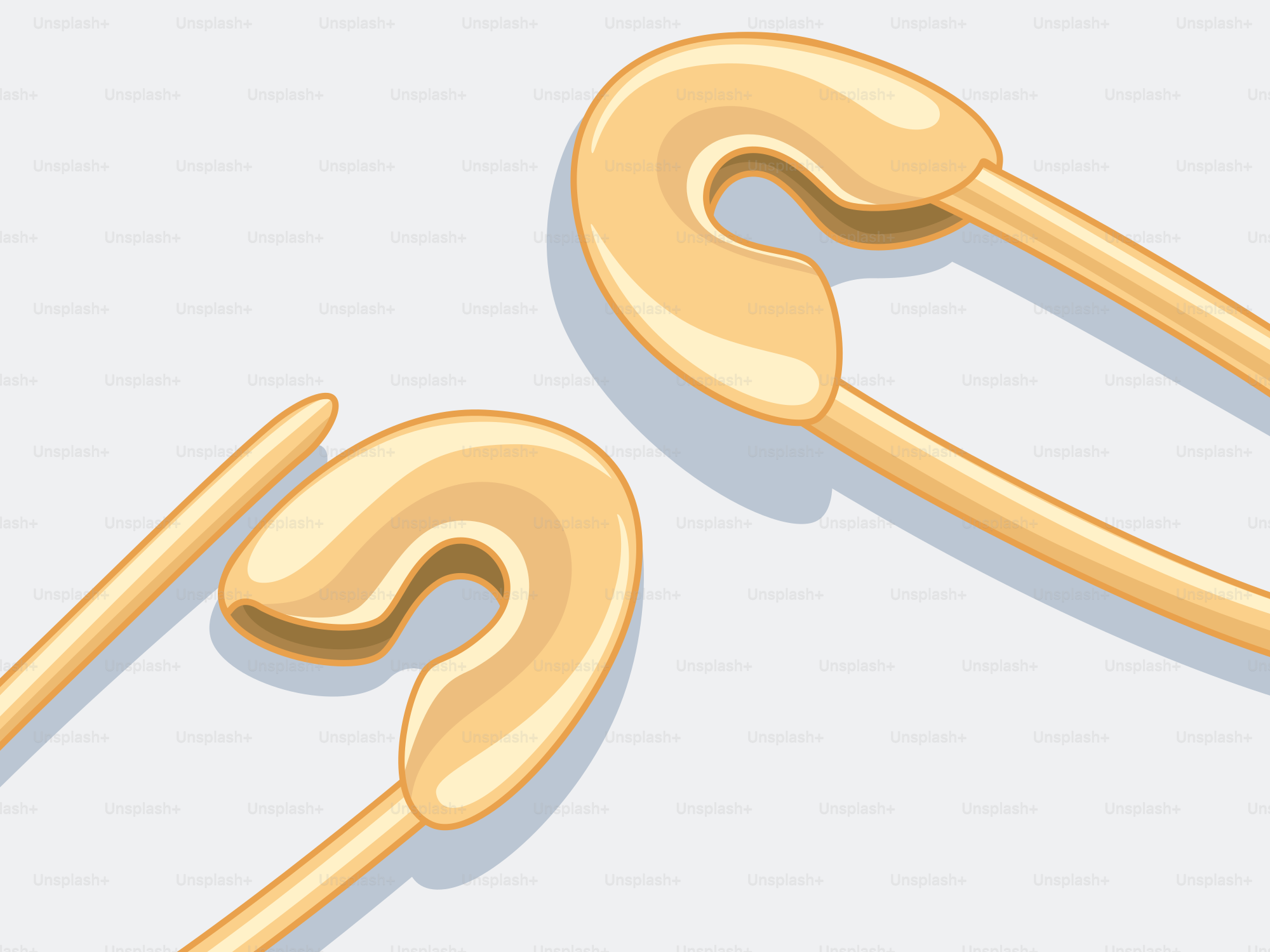 Dois alfinetes de segurança dourados são mostrados.