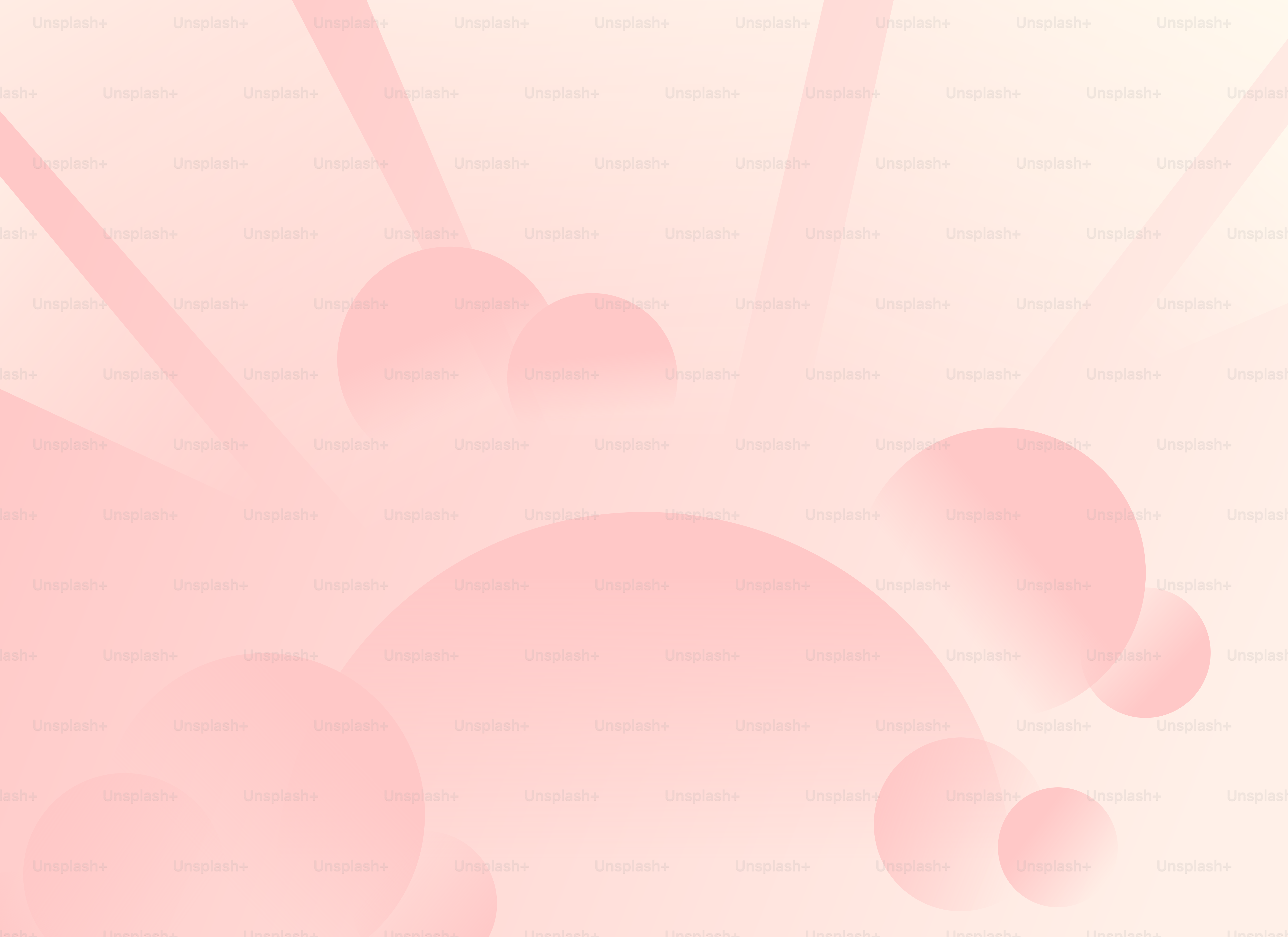 Abstract, pastel pink shapes with rays of light.