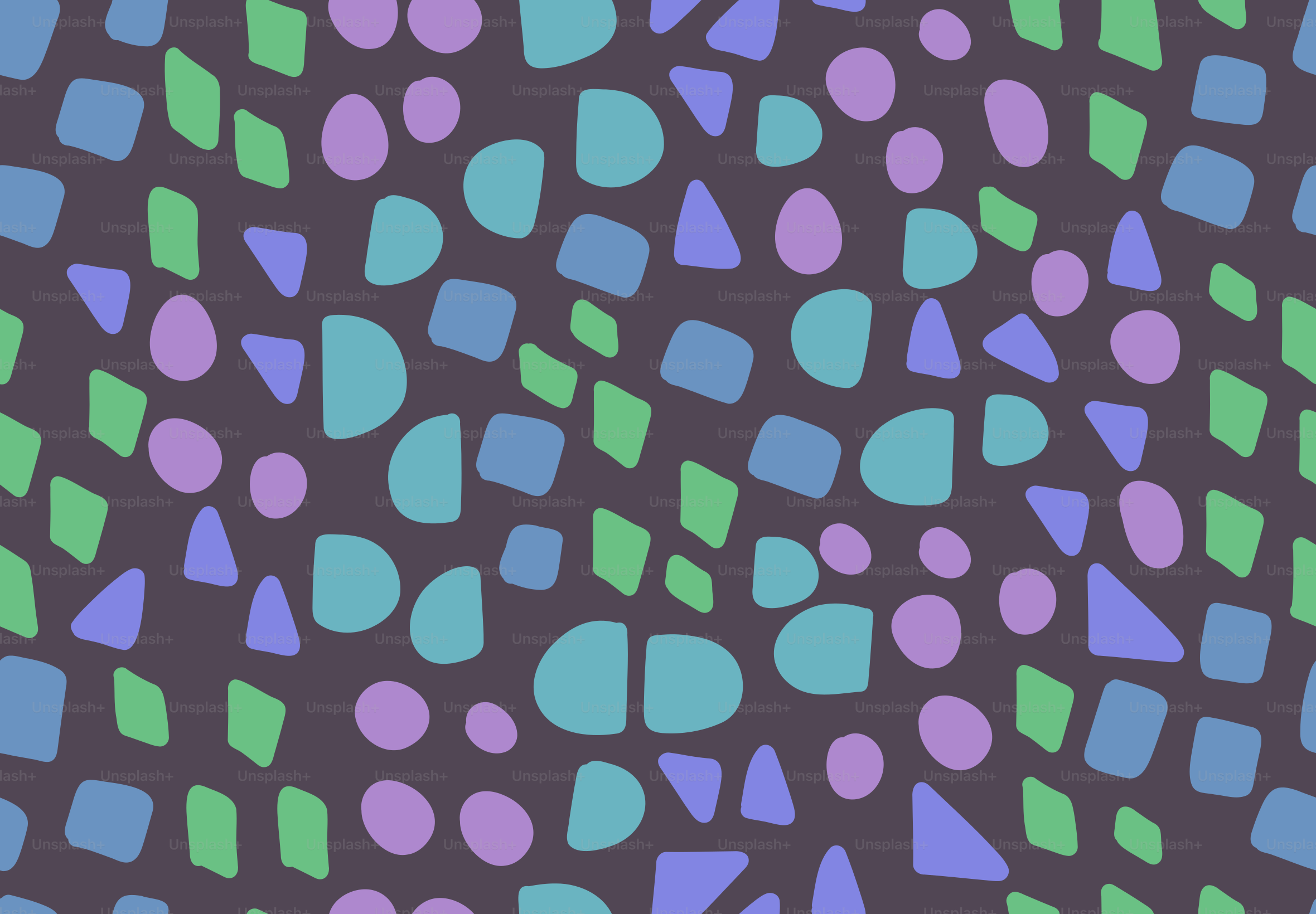 Shapes in various colors on a dark background.