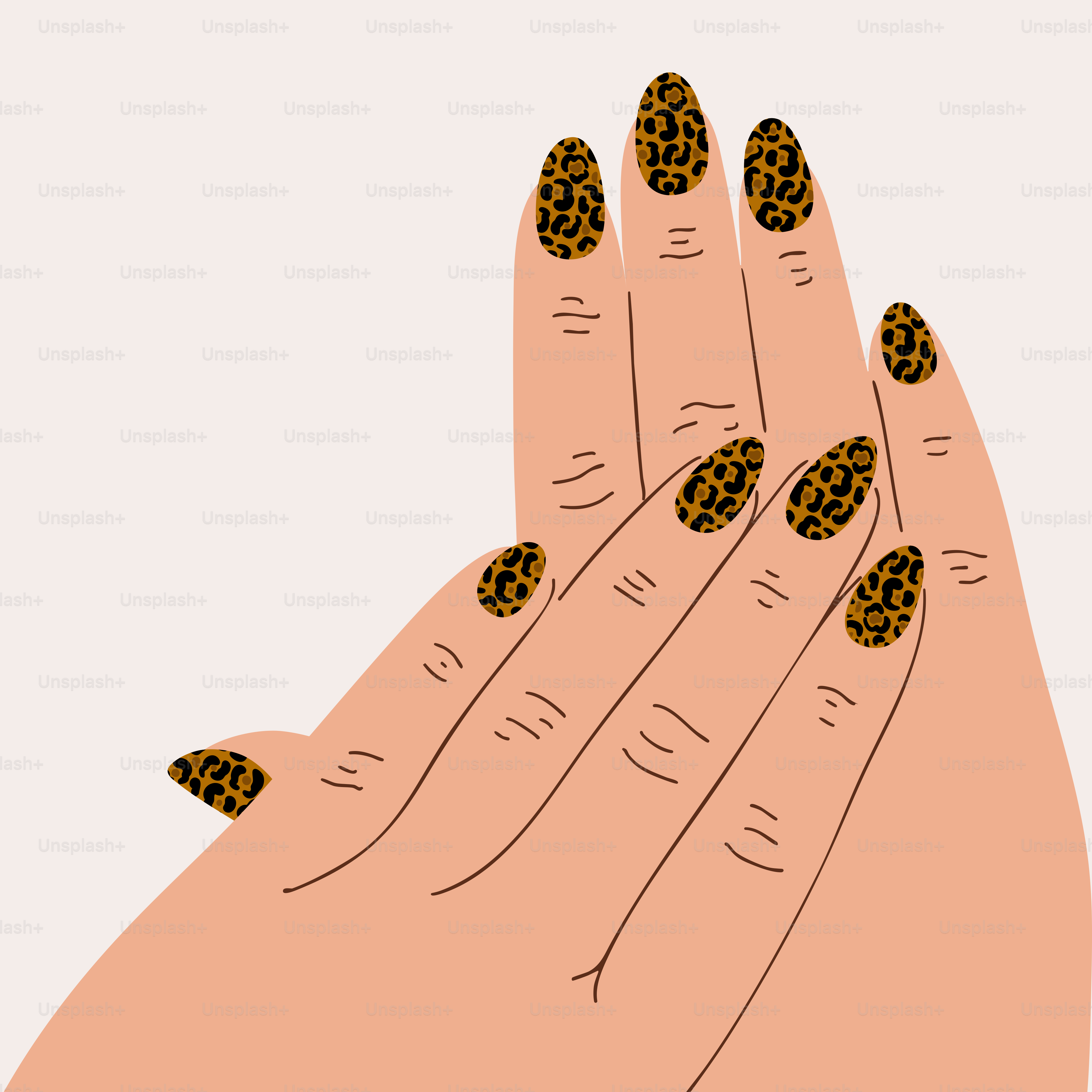 Mains avec un art d’ongles à imprimé léopard
