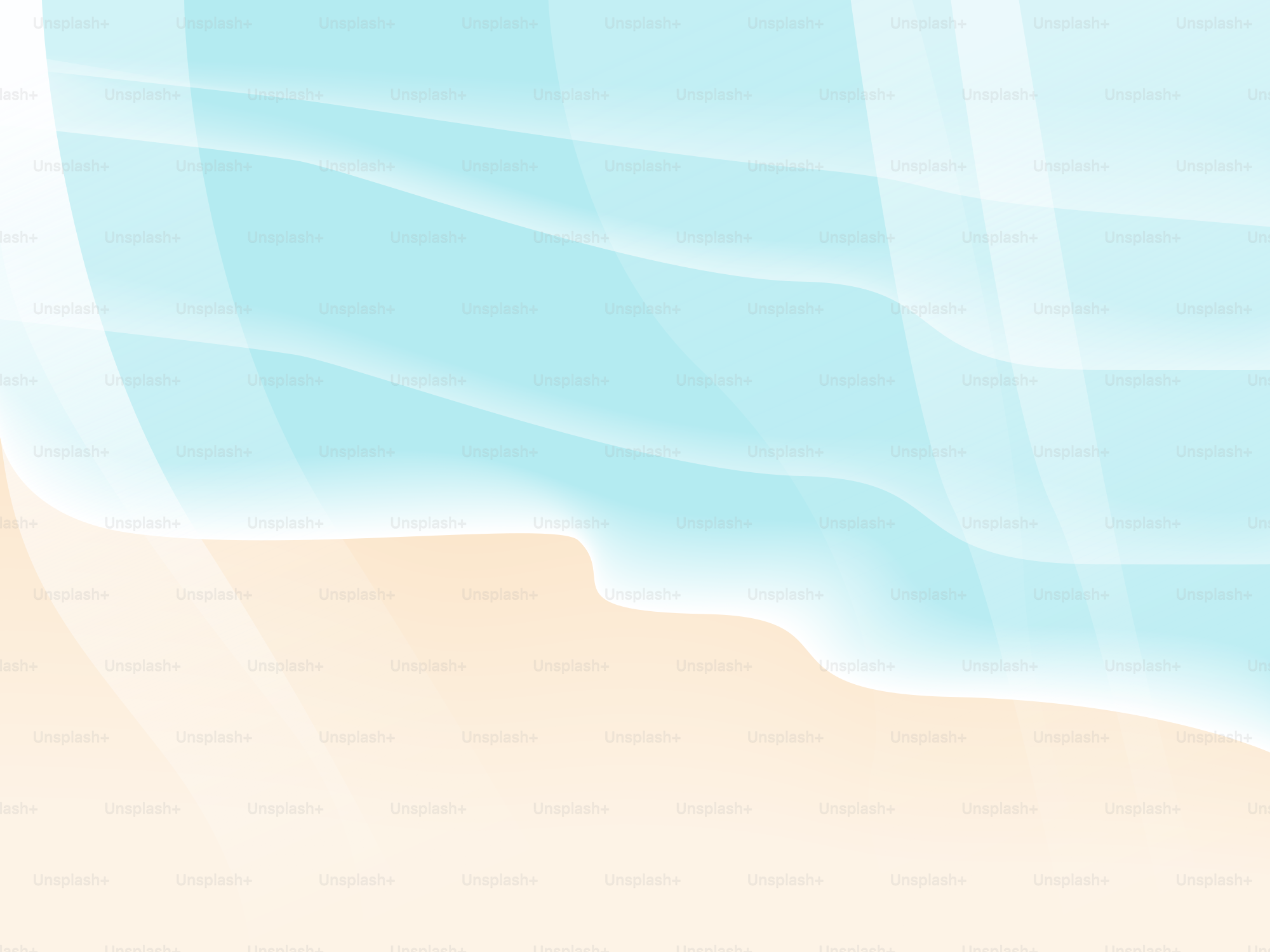 Les vagues lèchent doucement la plage de sable.