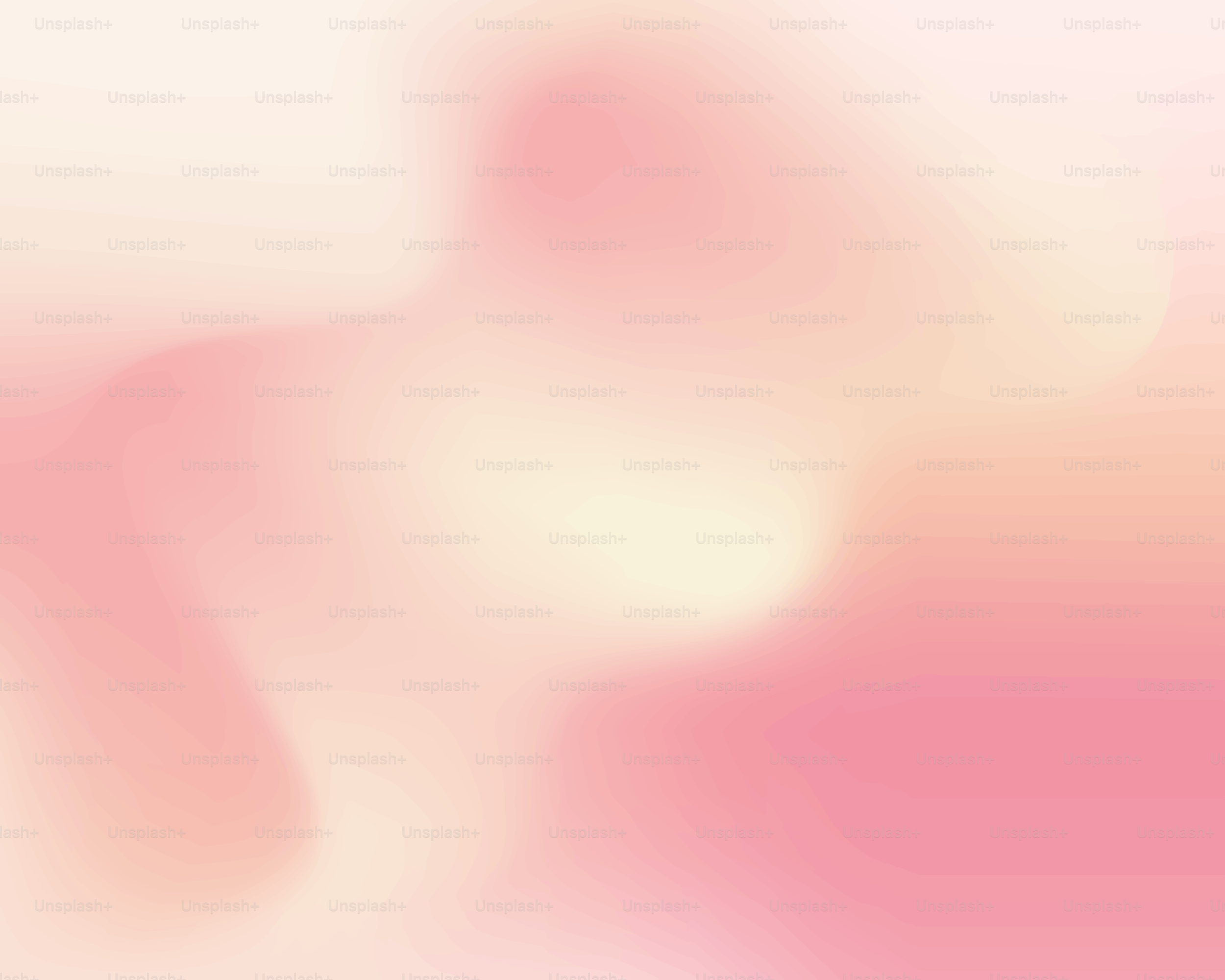Soft pink and white gradient background.