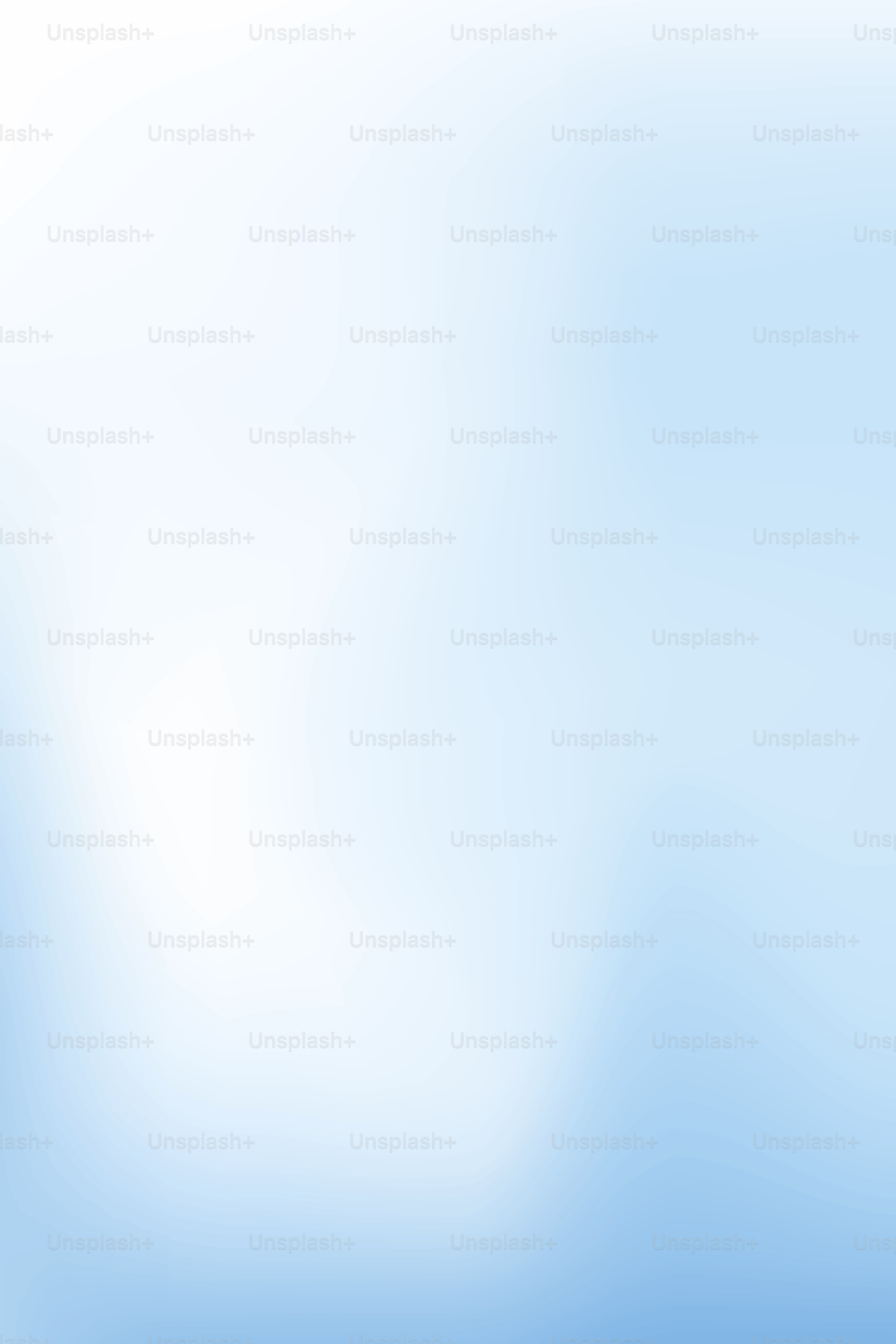 A light blue and white gradient background.