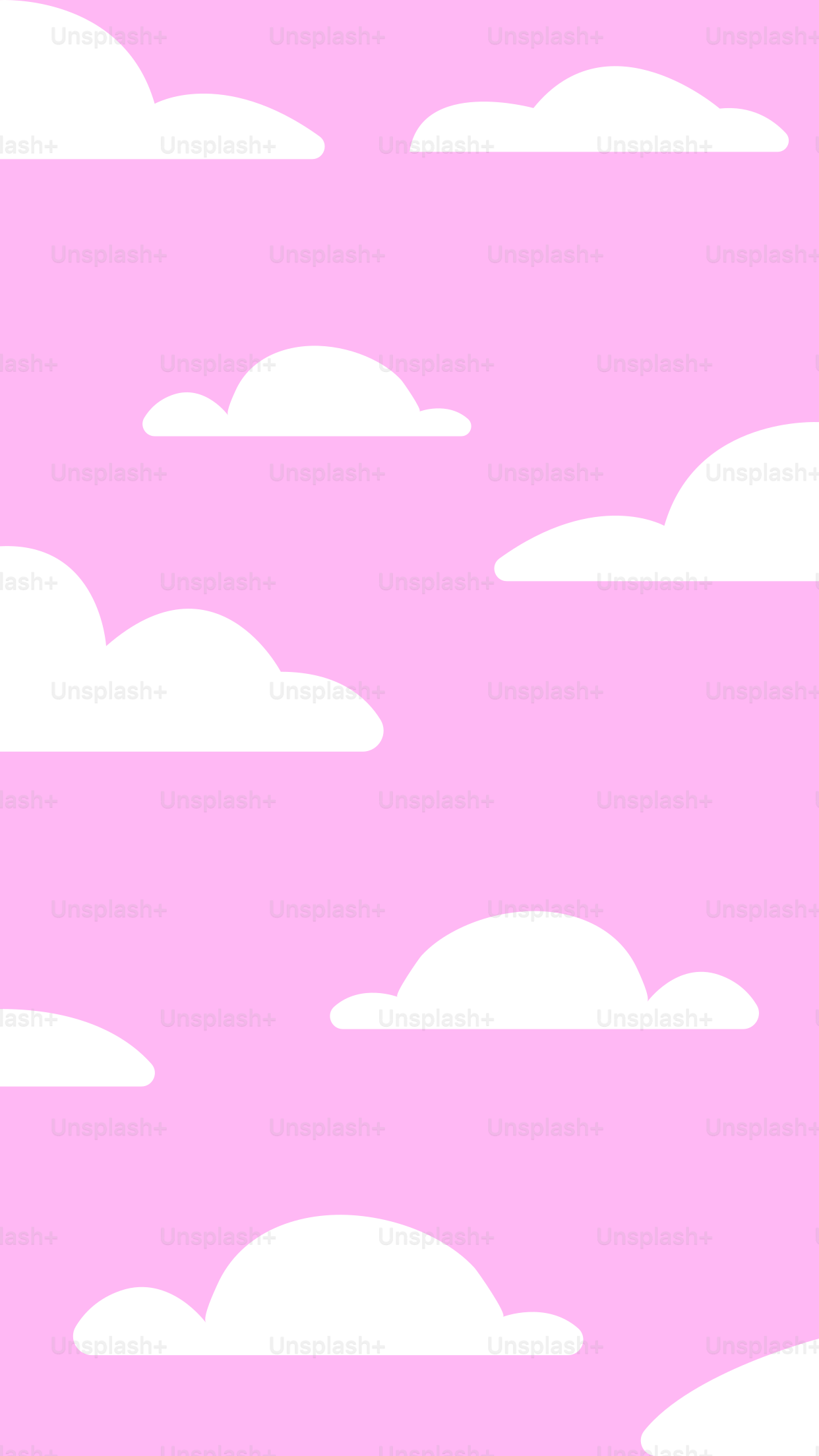 White clouds float in a pink sky.