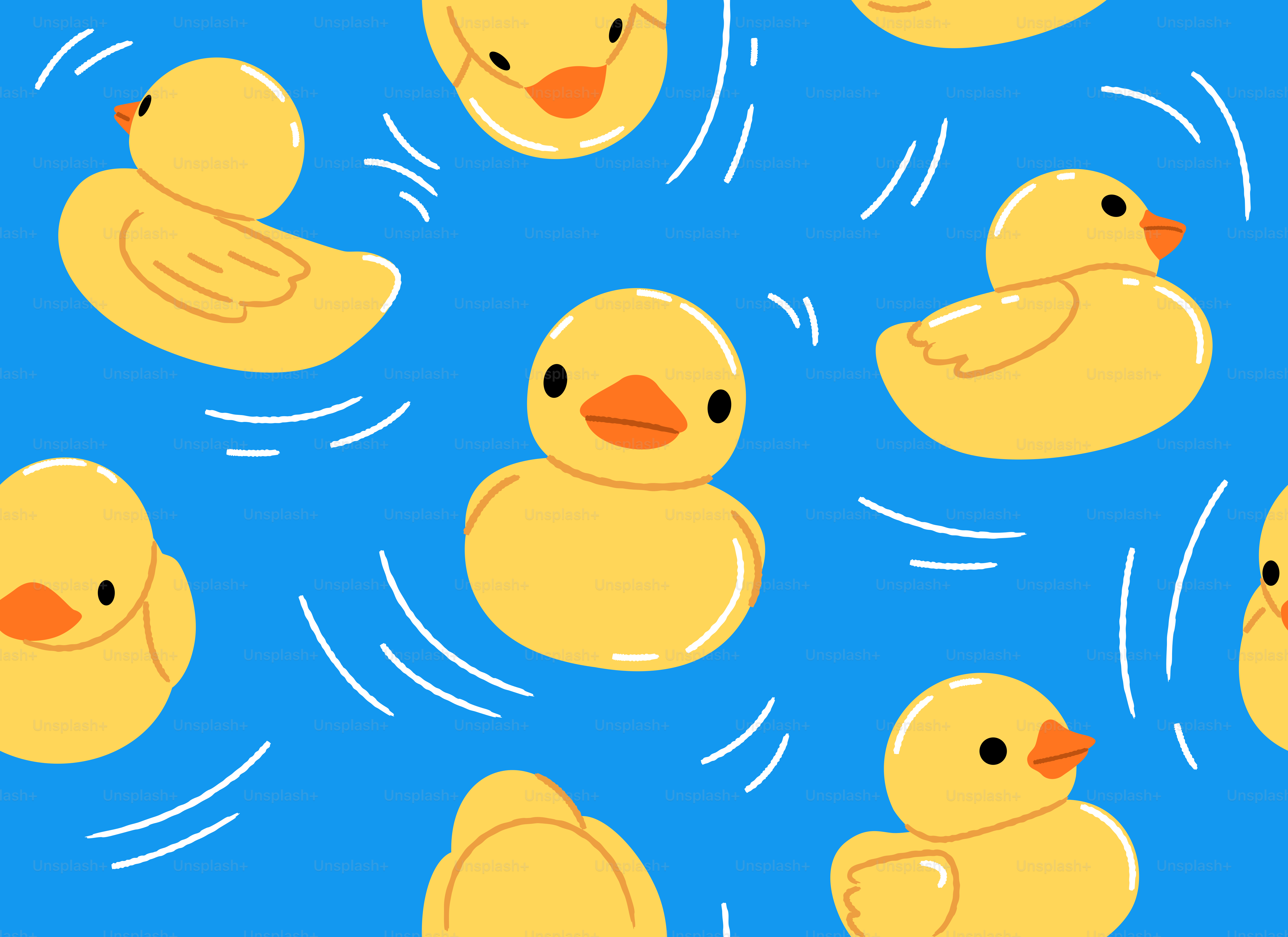 Des canards en caoutchouc jaunes flottent sur l’eau bleue.