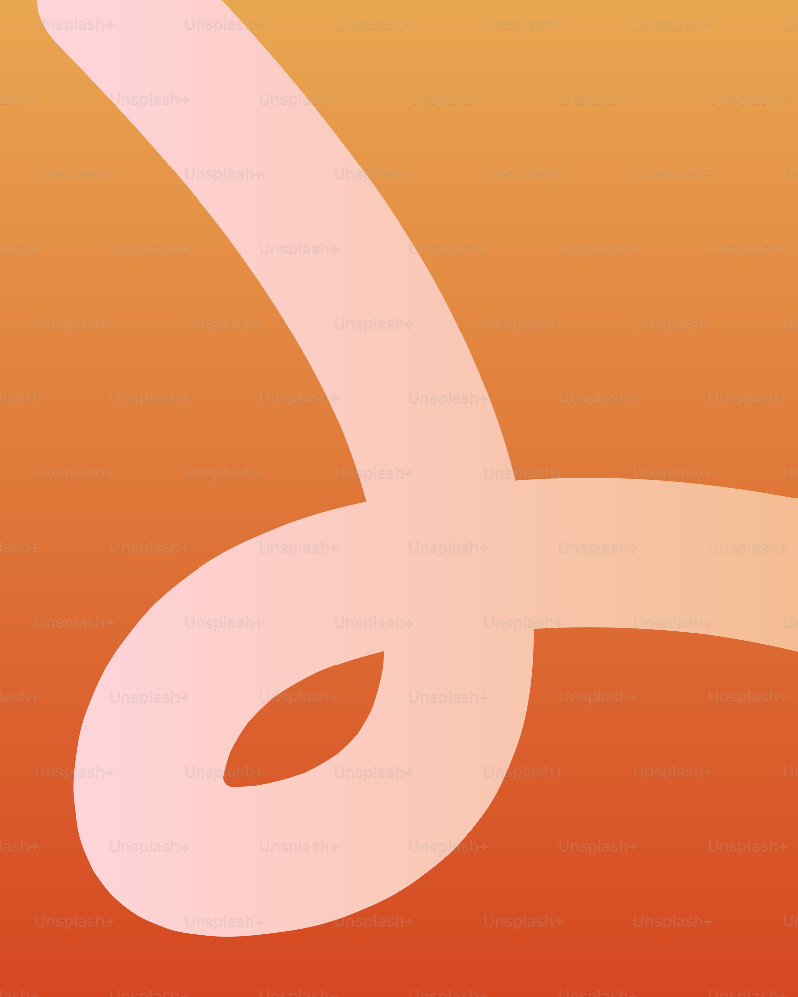 A stylized orange gradient with a white cursive stroke.