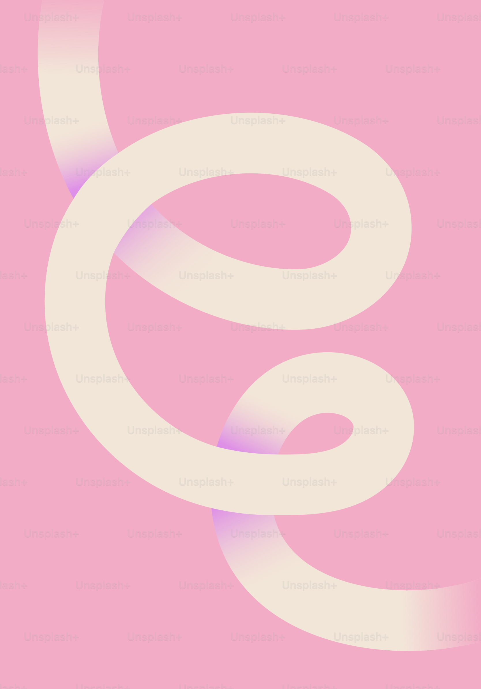 Creamy ribbon forms abstract shape on pink background