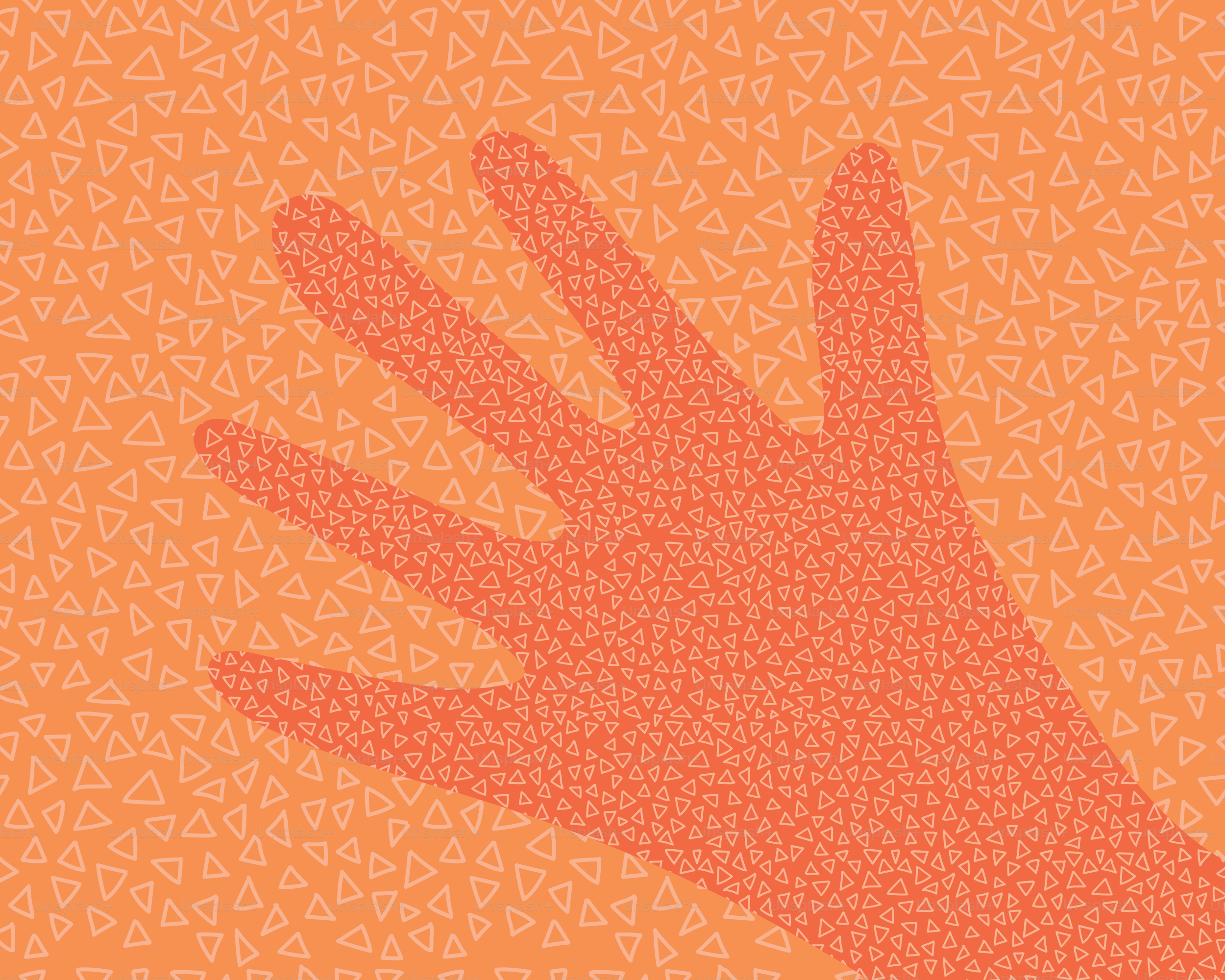Shadow of a hand on an orange textured surface