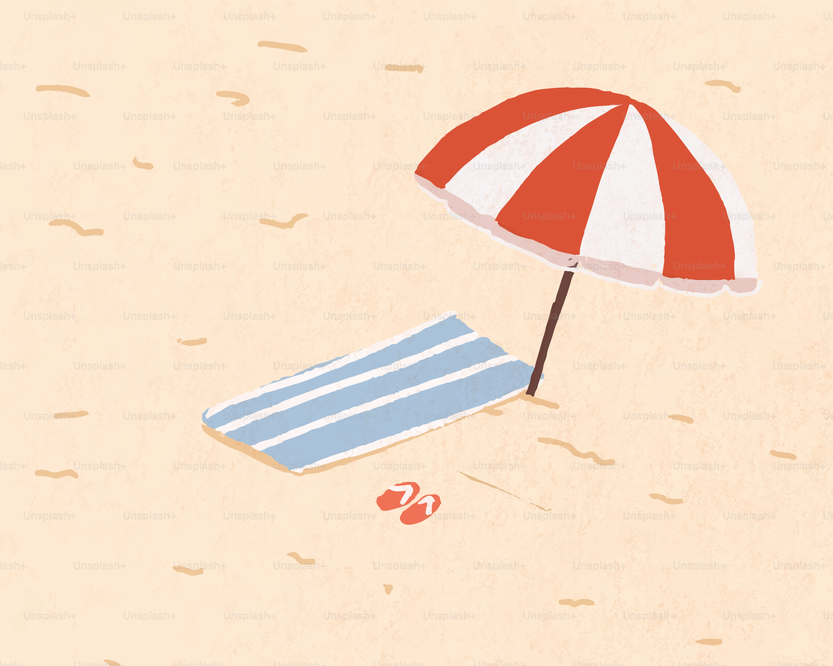 Parasol et serviette sur une plage de sable