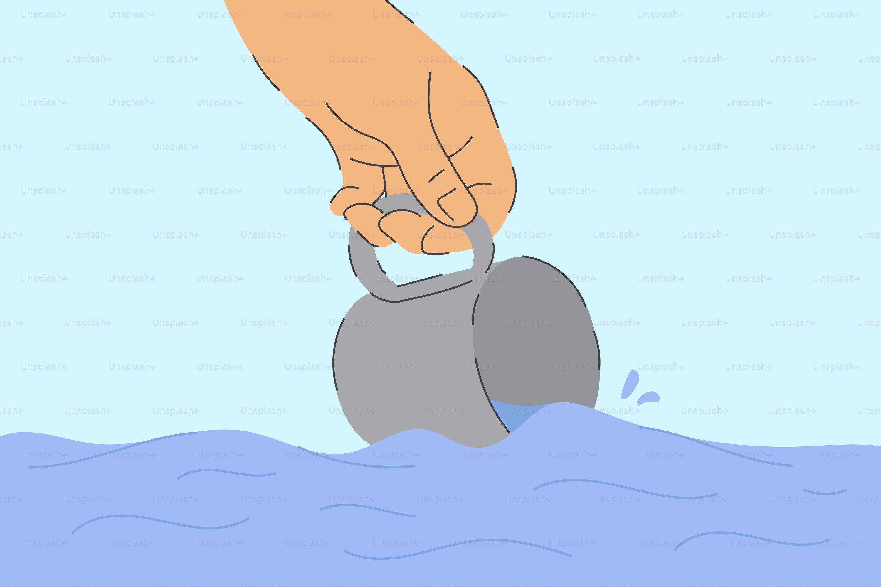 Hand holding a bucket in blue water