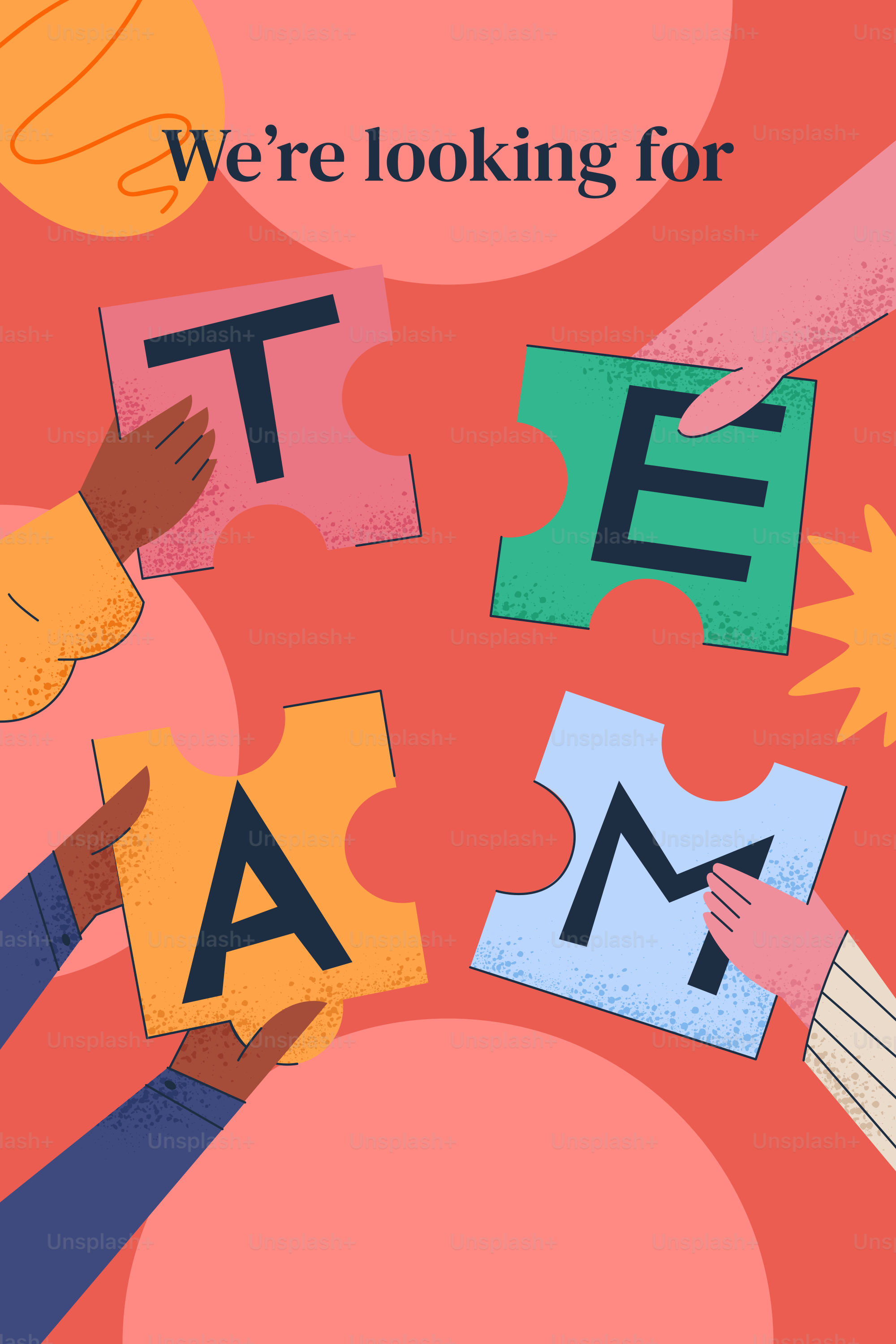 Hands assembling puzzle pieces spelling team