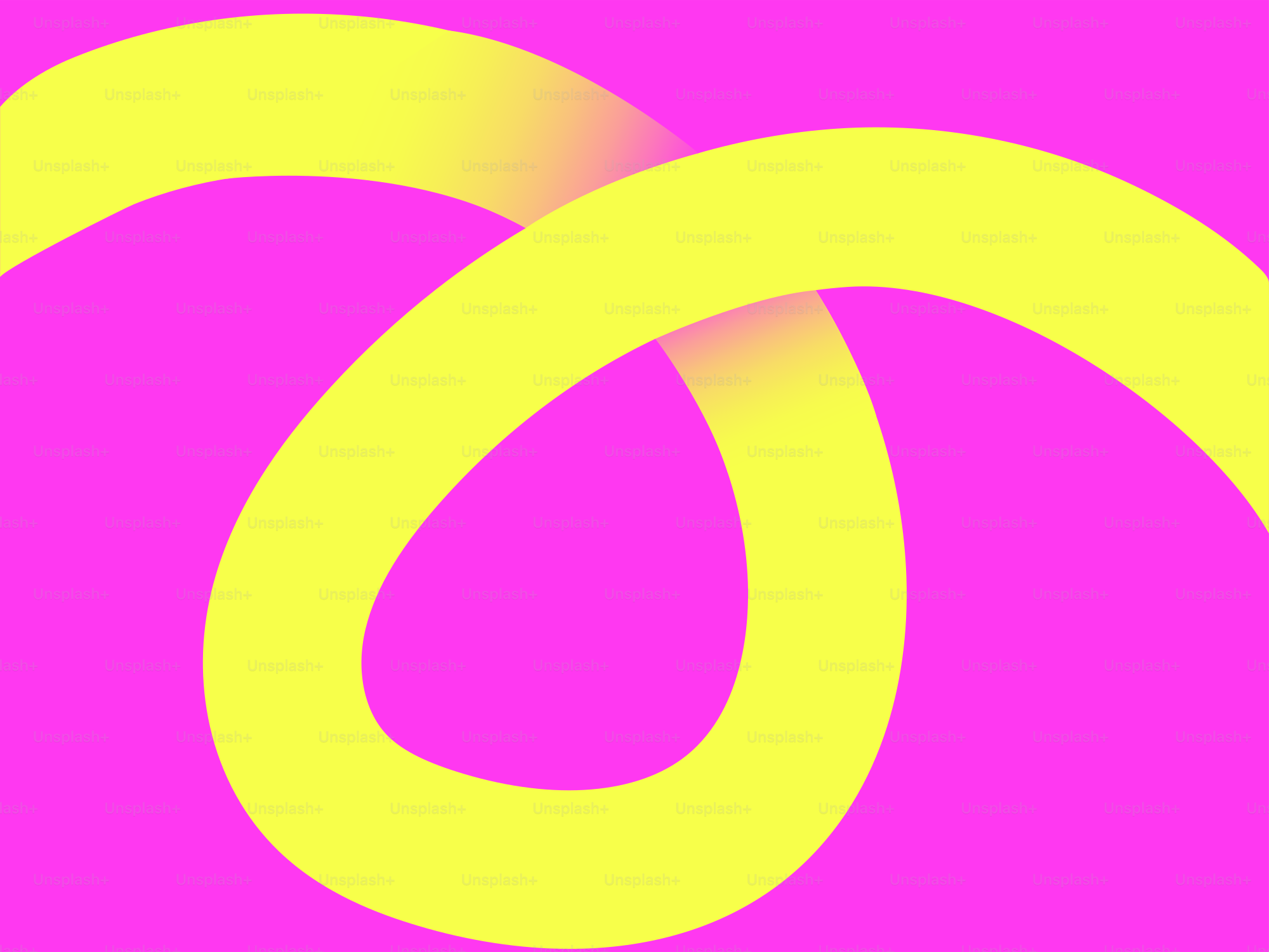 Yellow ribbon intertwined on a pink background