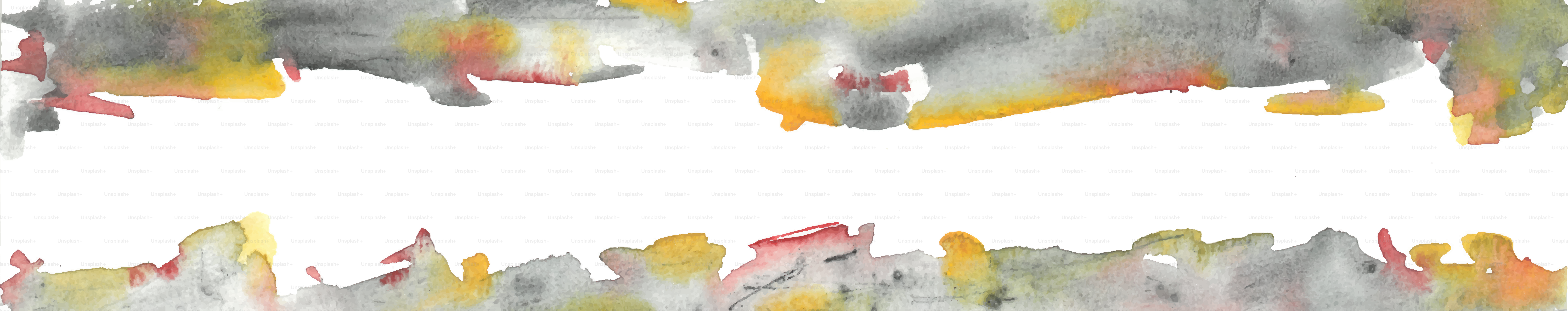 Abstract watercolor splashes of yellow, red, and green.