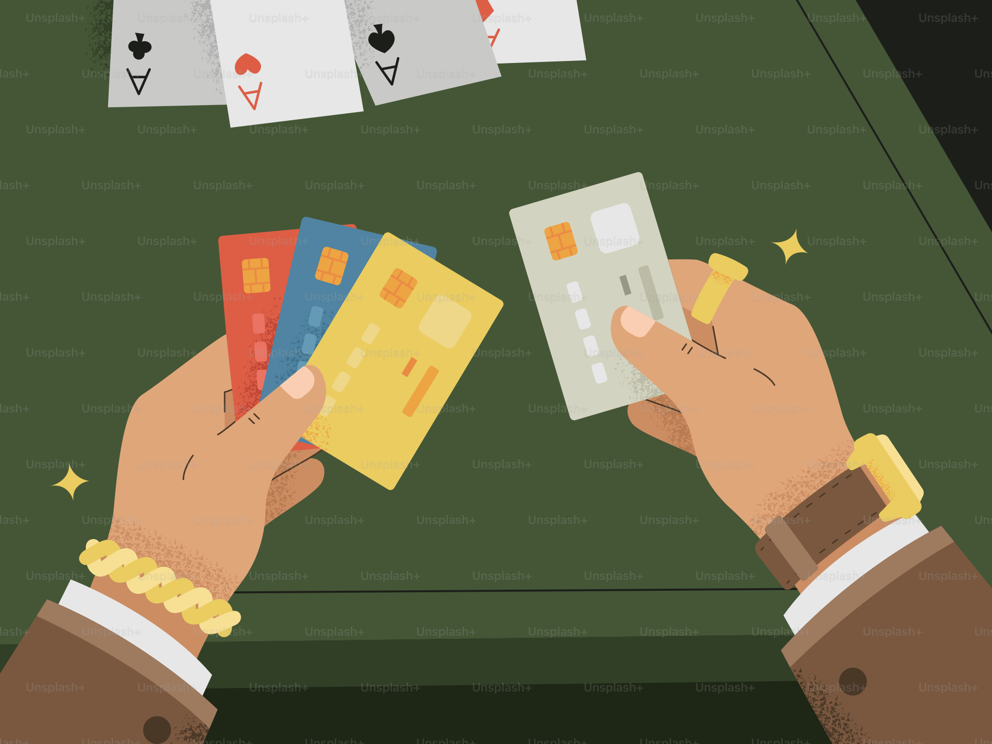 Mãos segurando cartões de crédito e cartas de baralho na mesa